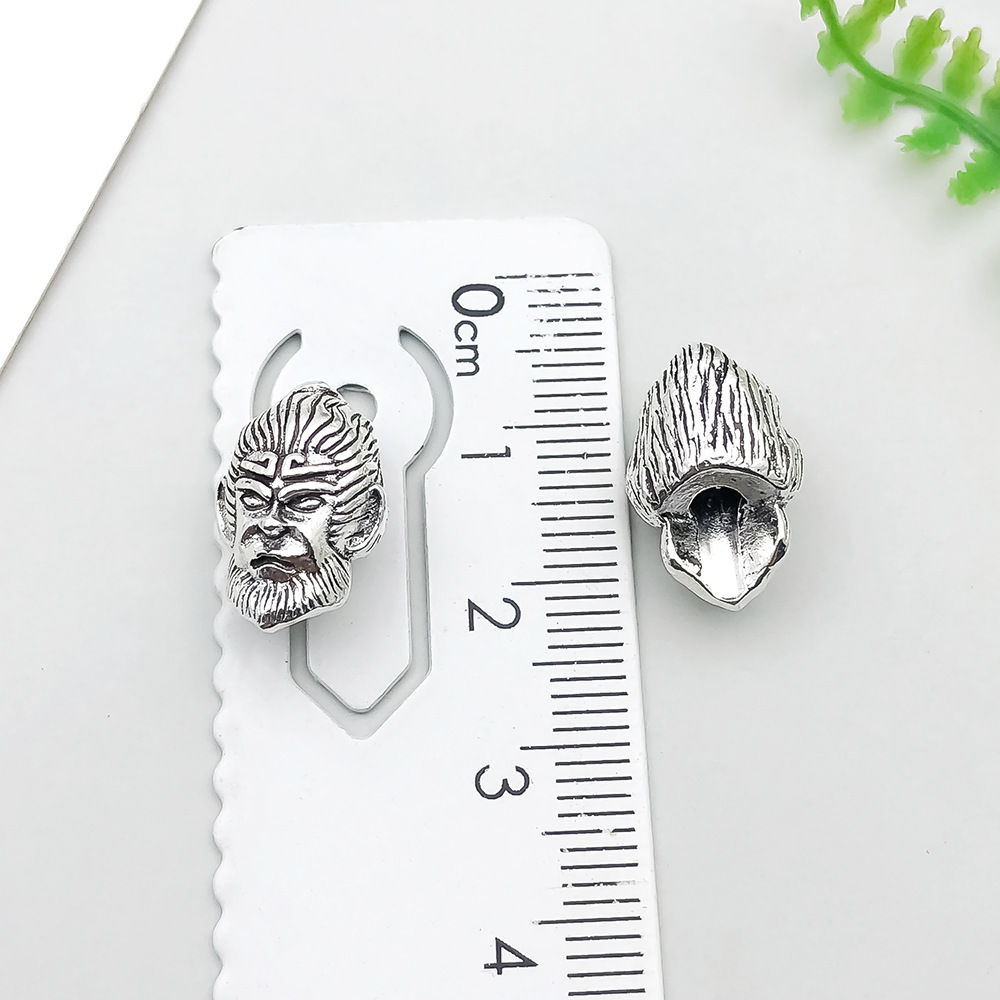 1 ancient silver qitian dash buddha head 15*10mm-3.7g-21012