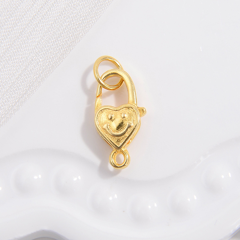 Gold love smiley lobster clasp