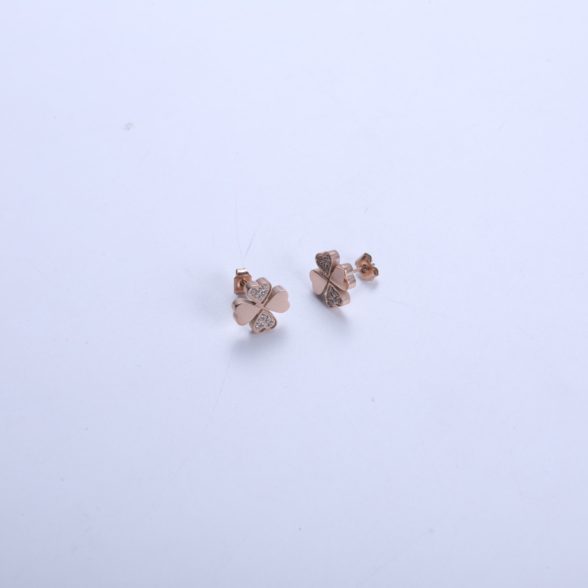 Rose gold four-leaf clover earrings