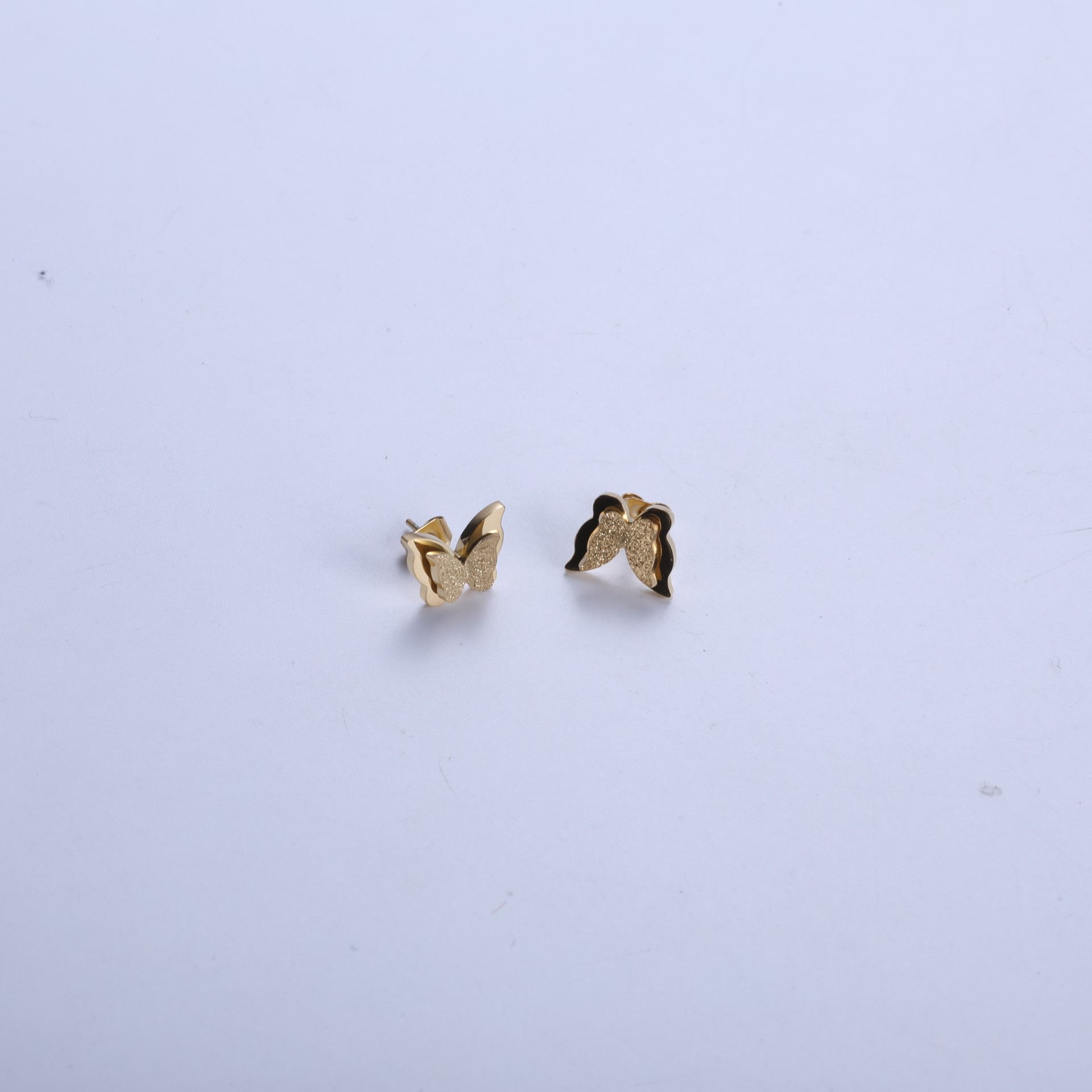 Gold butterfly earrings