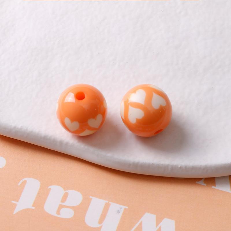 Orange heart beads