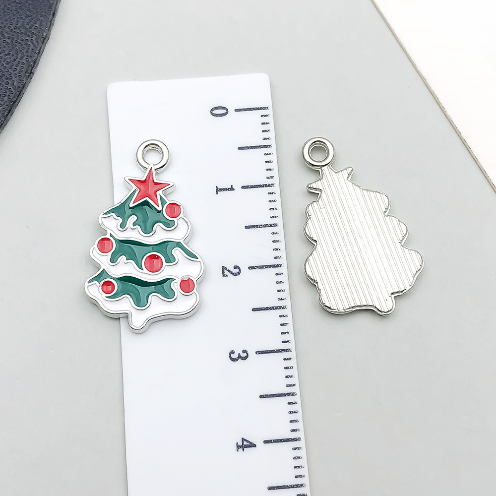 1 green dripping oil christmas tree 24*14mm-1.6g-19656