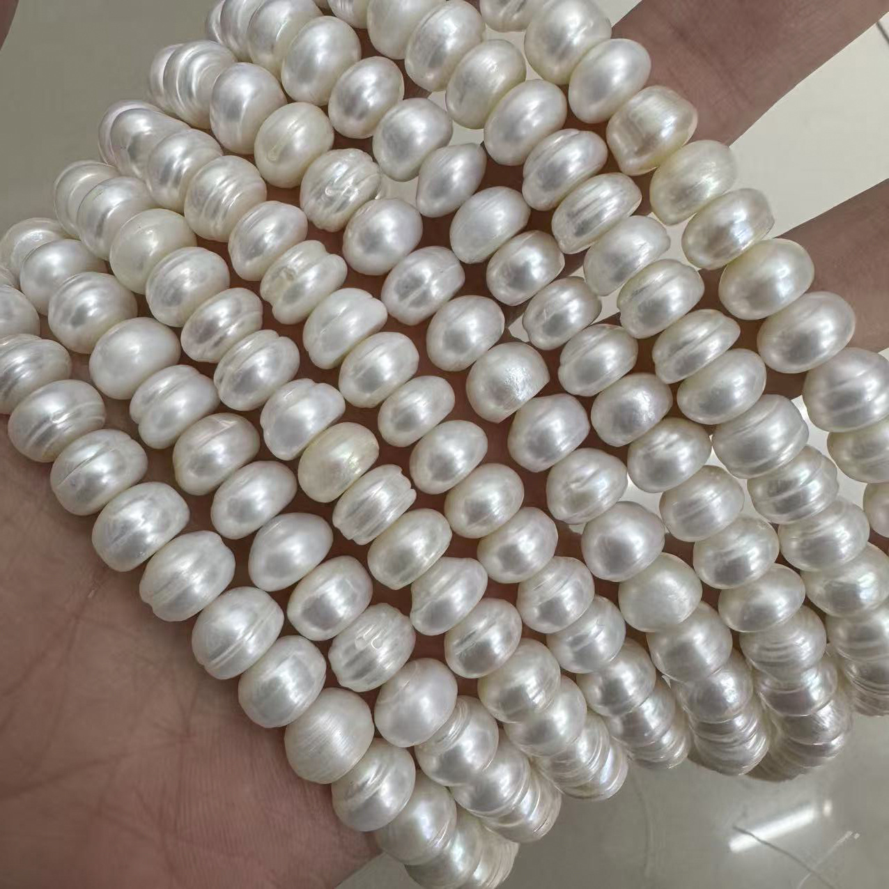 White 9-10mm threaded flat beads one piece