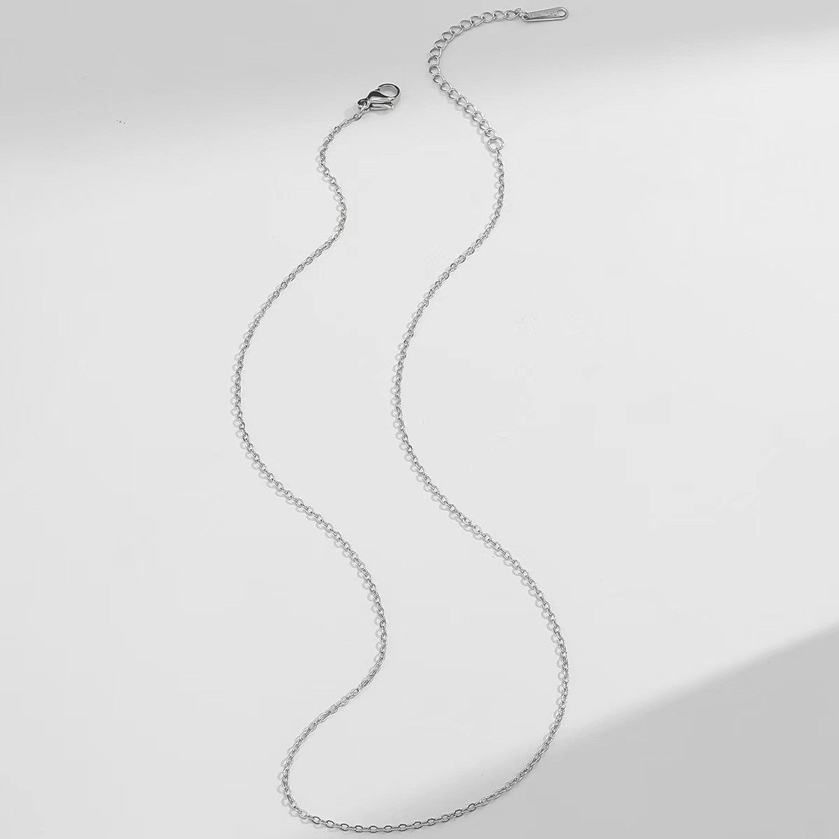 Steel color cross chain