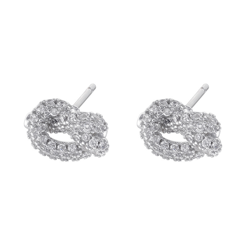 1 pair of white gold white diamond alkaline water knot earrings