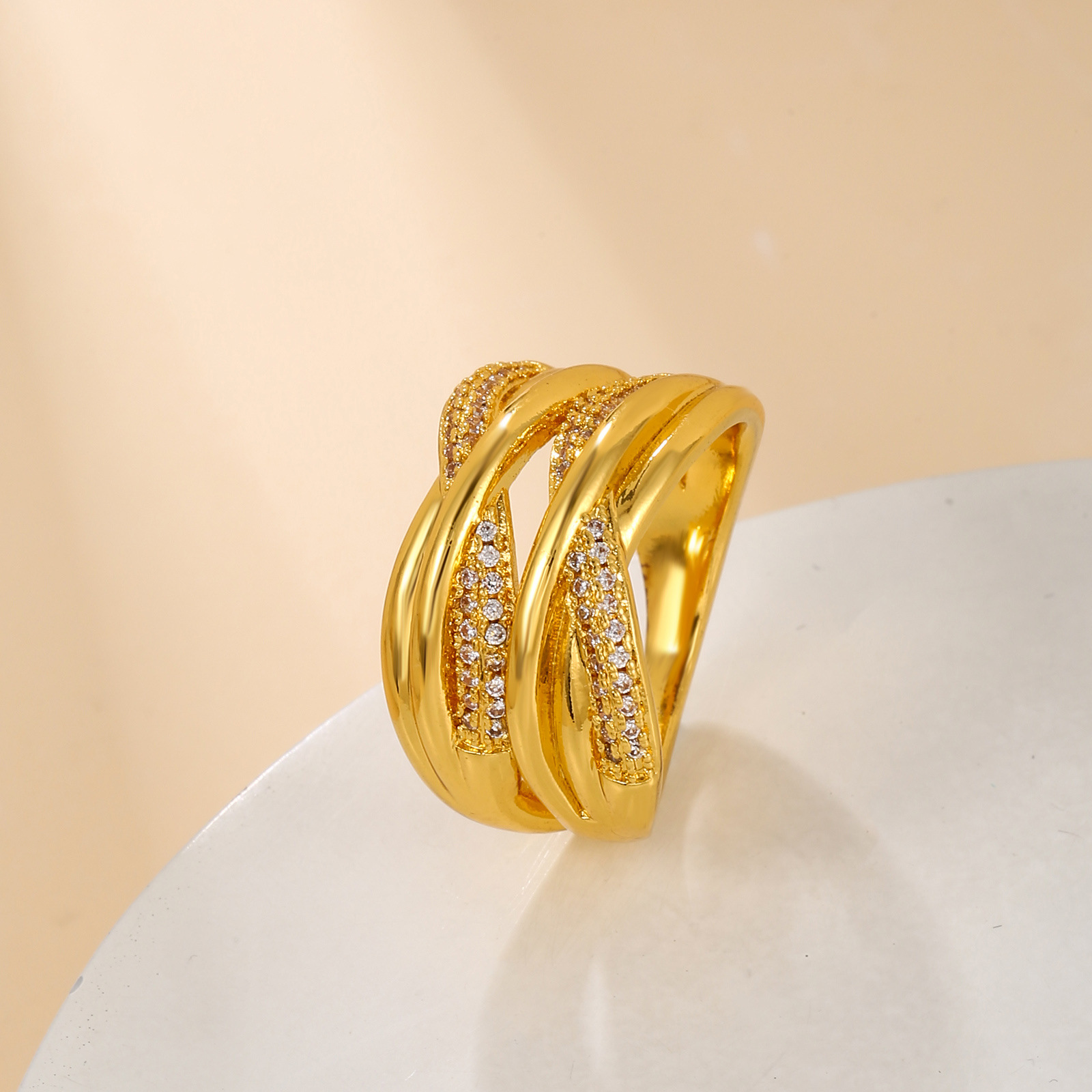 Copper - double row granny knot micropaved zirconia ring