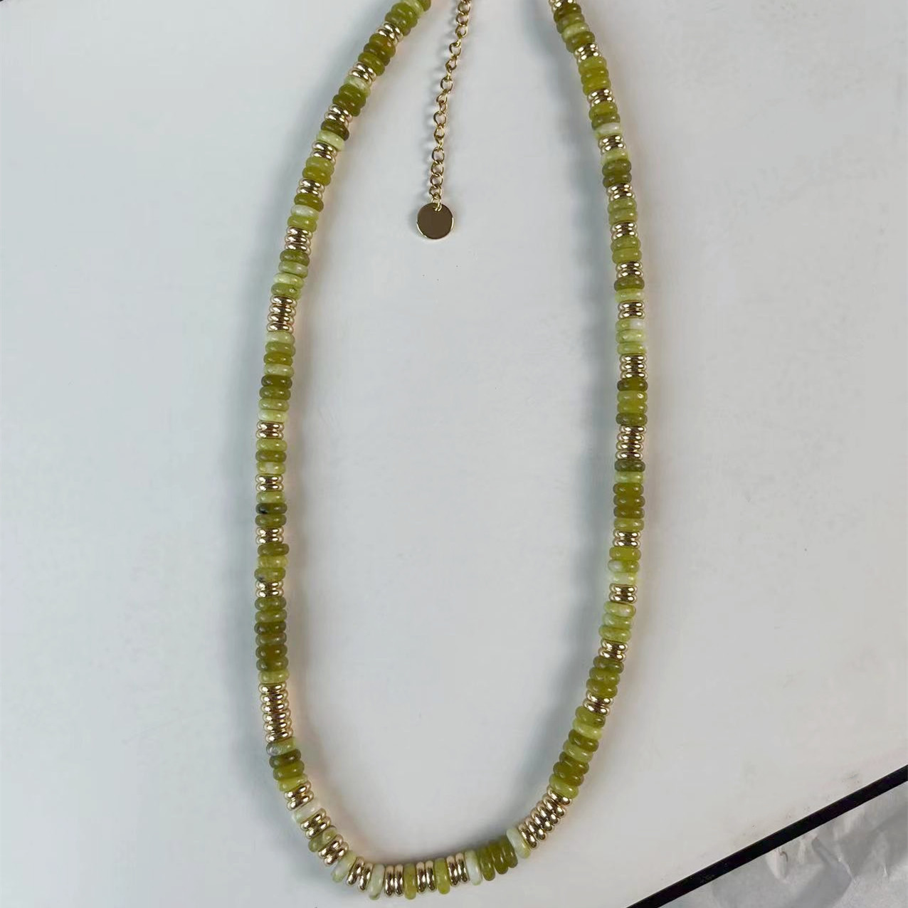Emerald Stone Frisbee Necklace