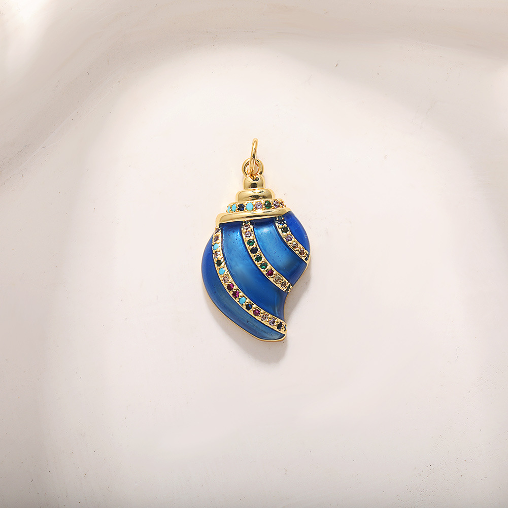 A610 blue conch with colored zircons