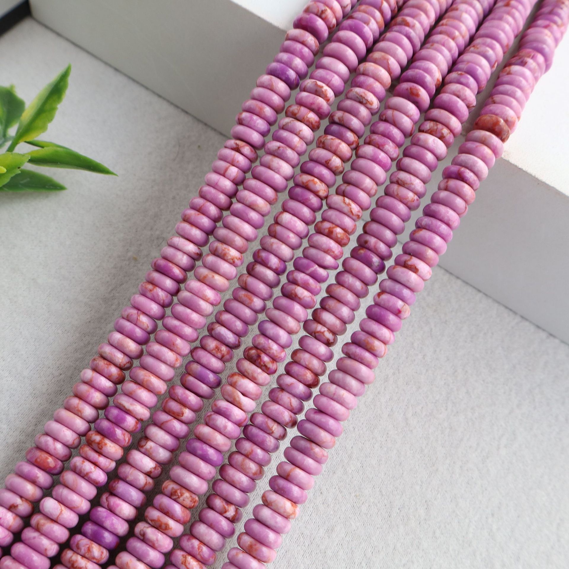 Pink purple emperor stone