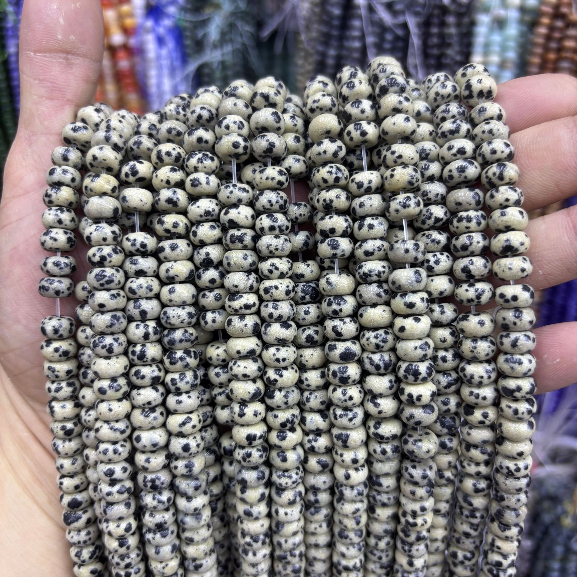 Black and white spotted abacus beads