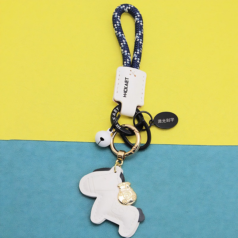 White leather pony   rope   bell   oval tag