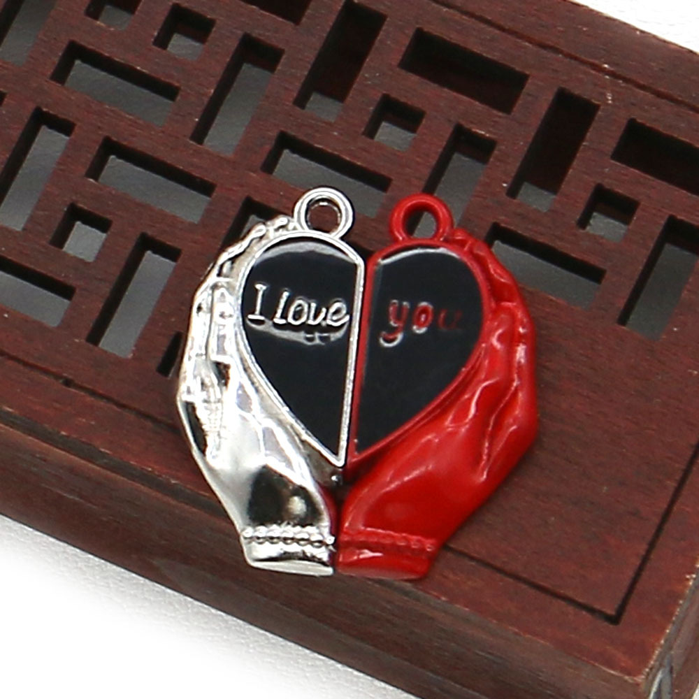 015 red silver holding black heart 25x27mm, 6g