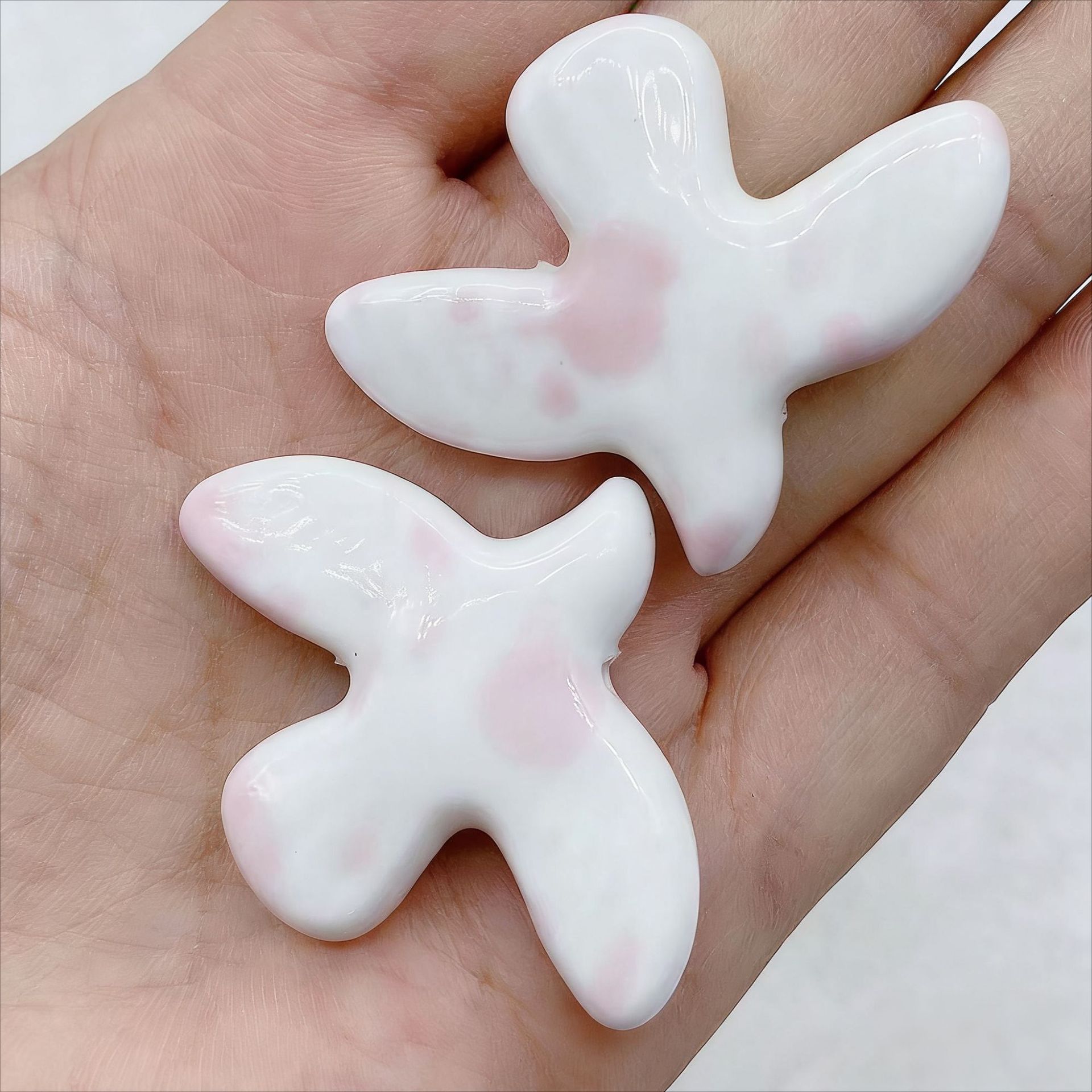 Pink smudge on white background