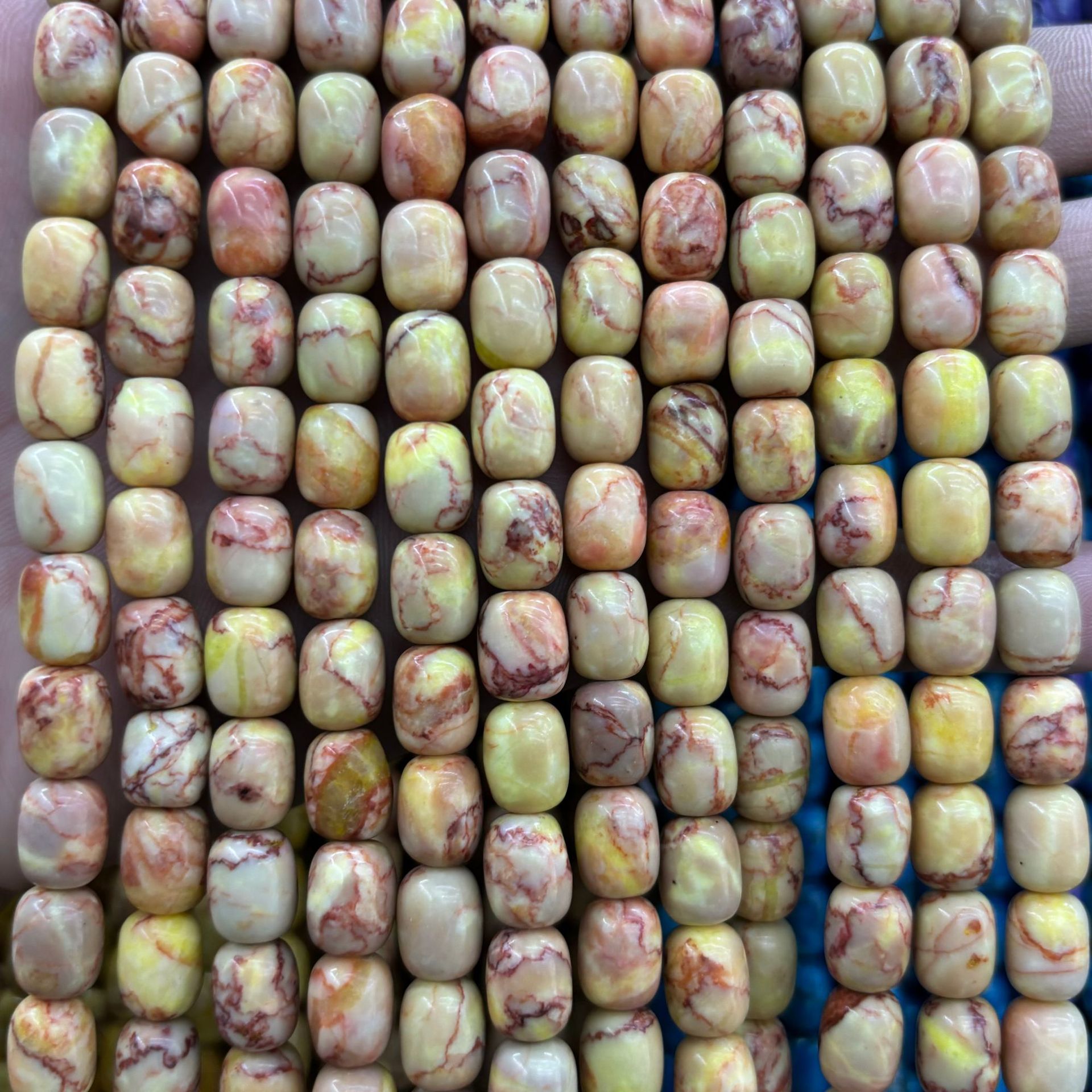 Blue and yellow barrel beads