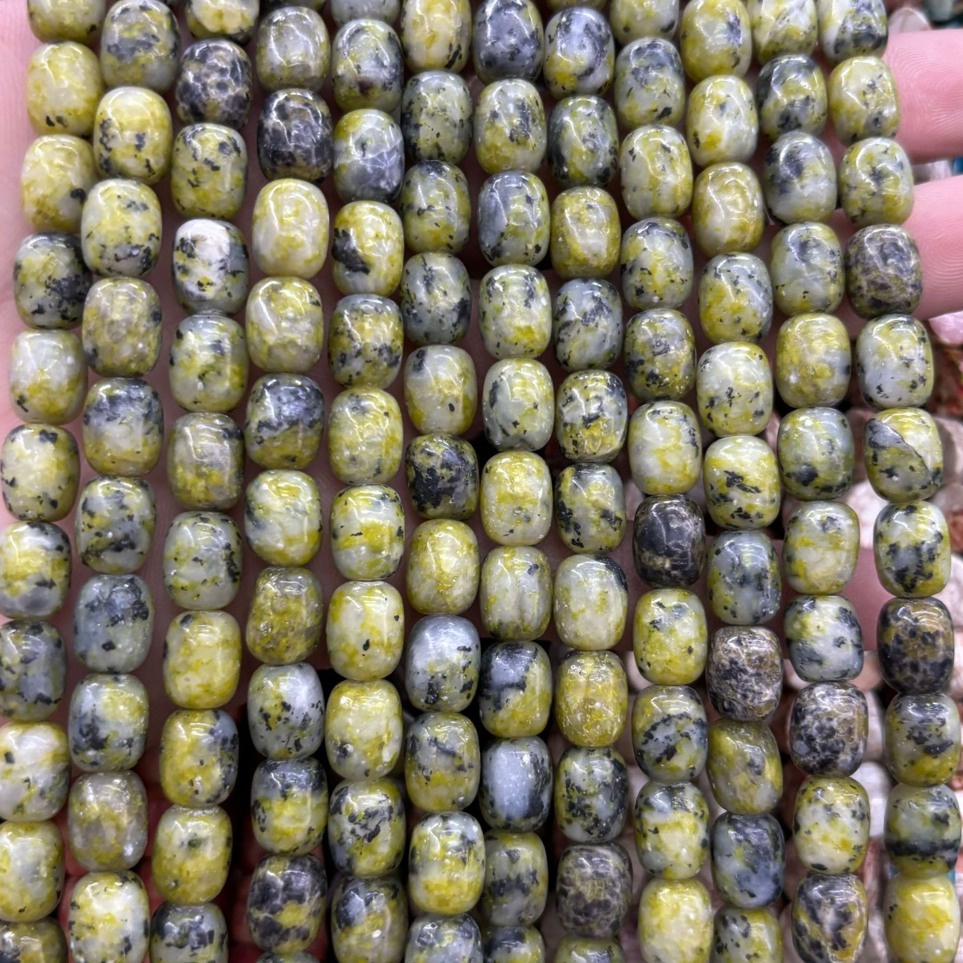 Pitted yellow barrel beads