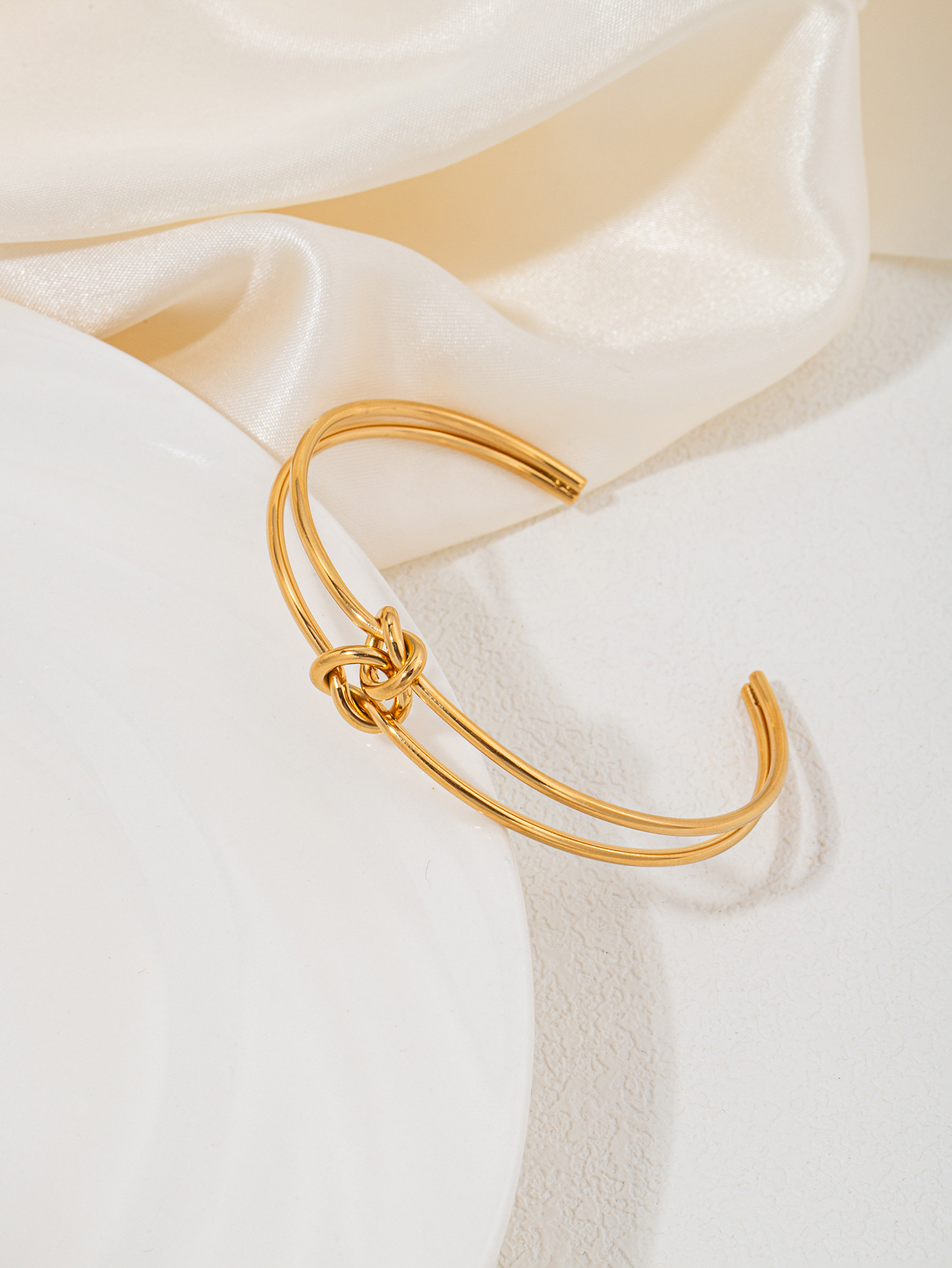 Double love knot-glossy-gold