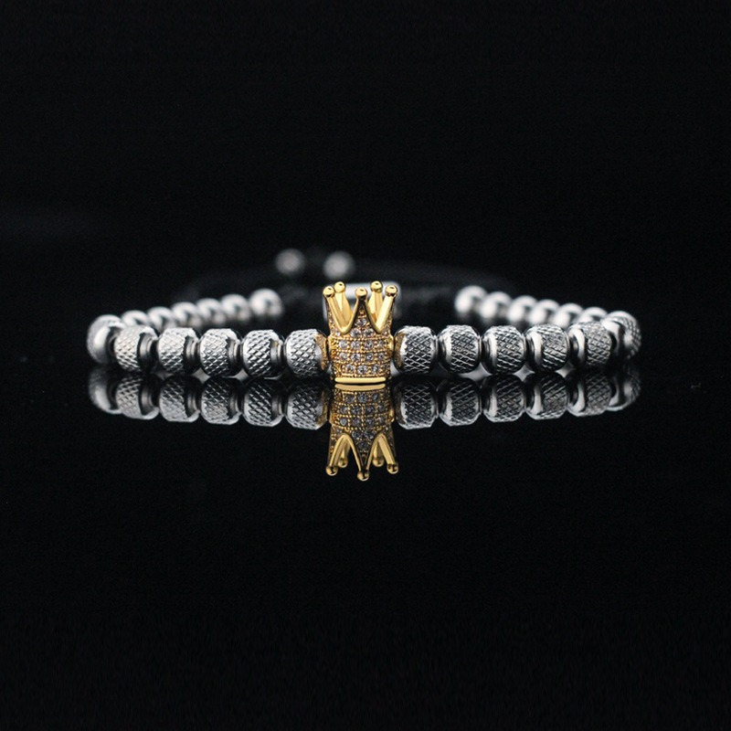 Steel gold crown with white zirconium