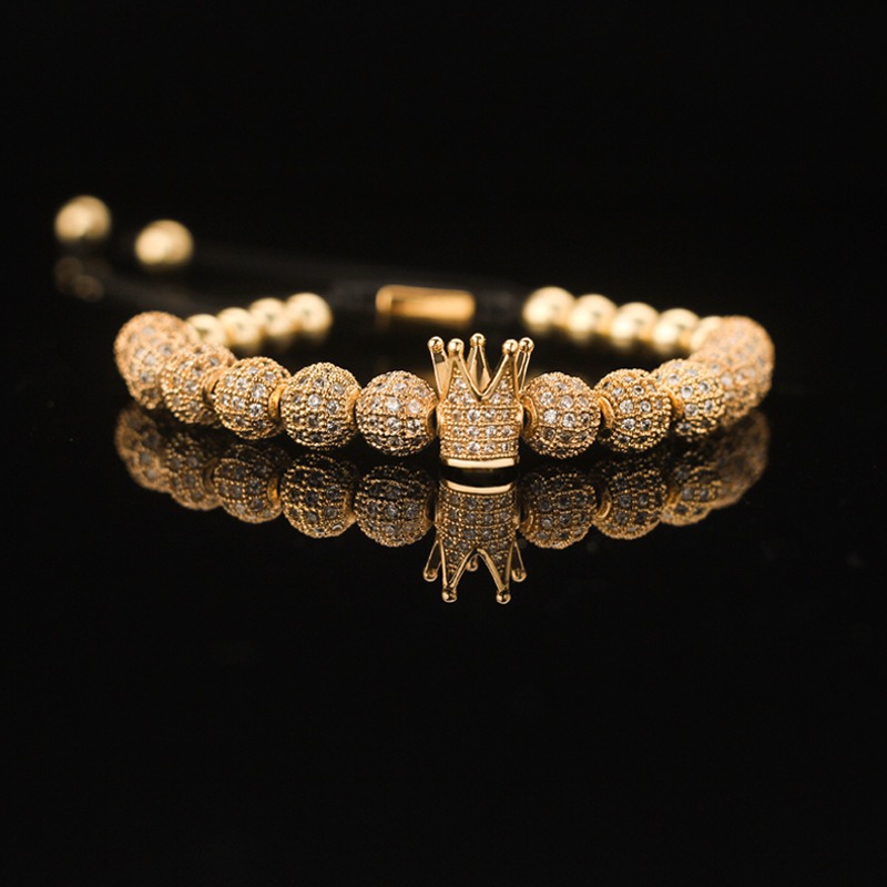 Golden crown with white zirconium zirconium ball