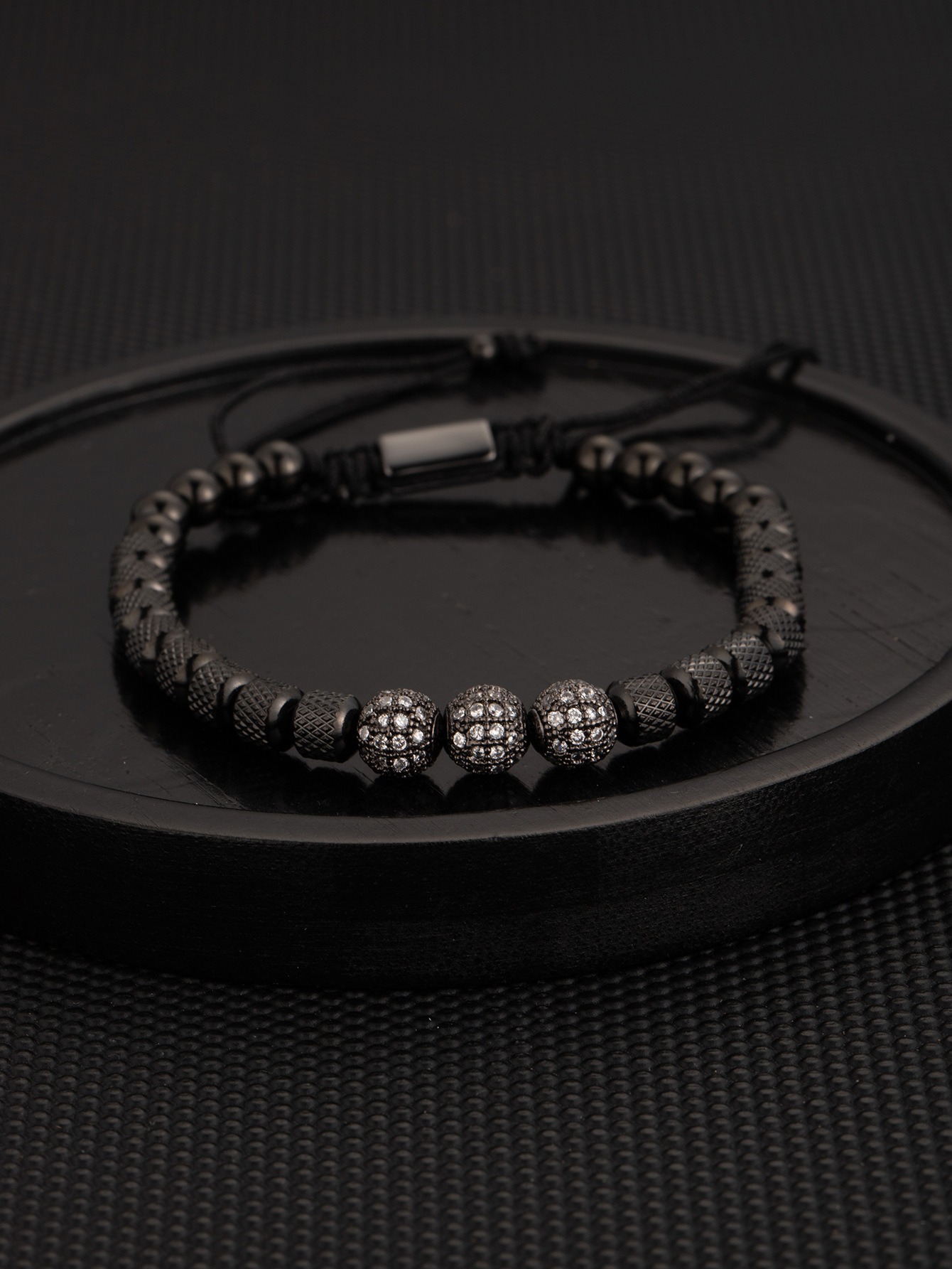 Black three consecutive zirconium ball bracelet