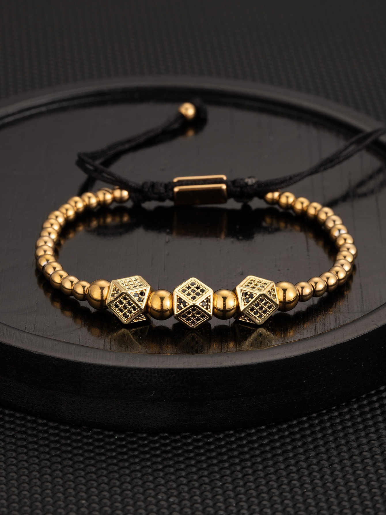 Gold dice bracelet