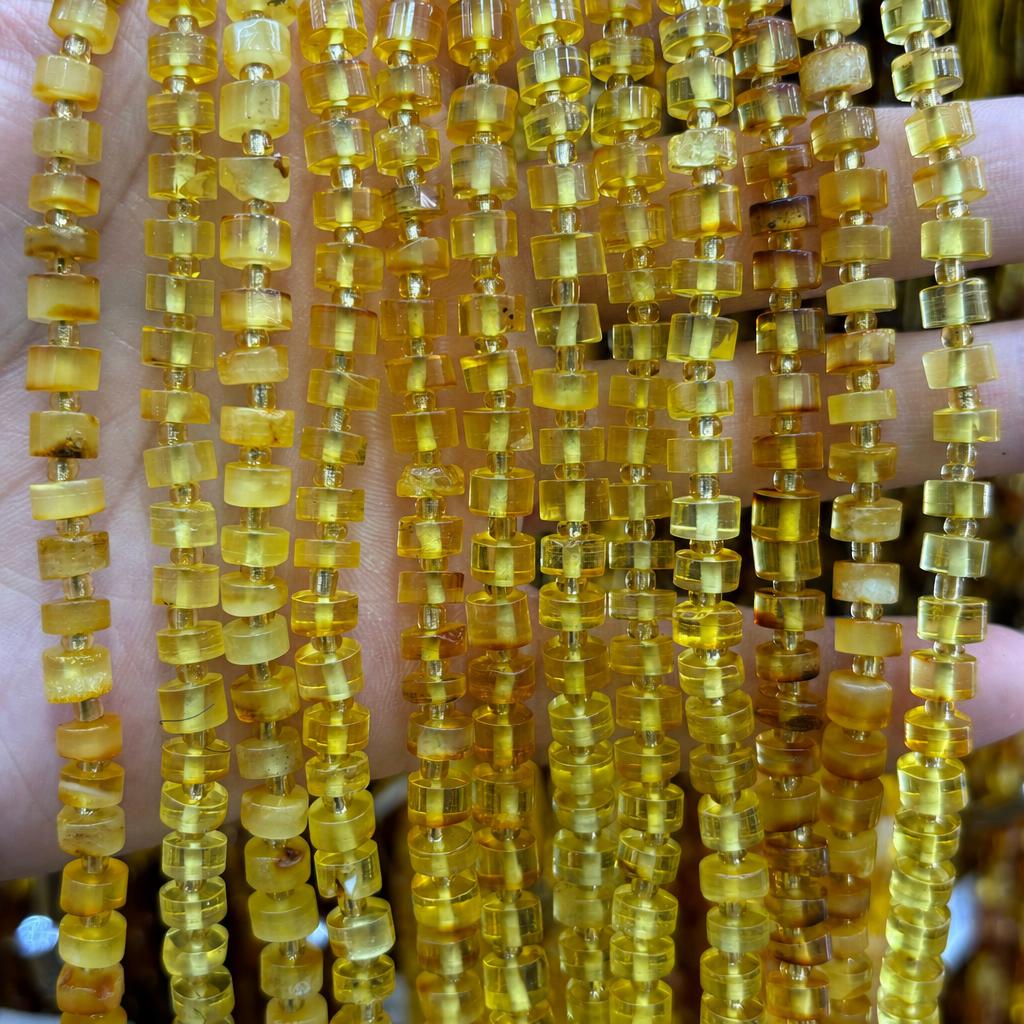 4x6mm amber spacers (about 67 pieces)
