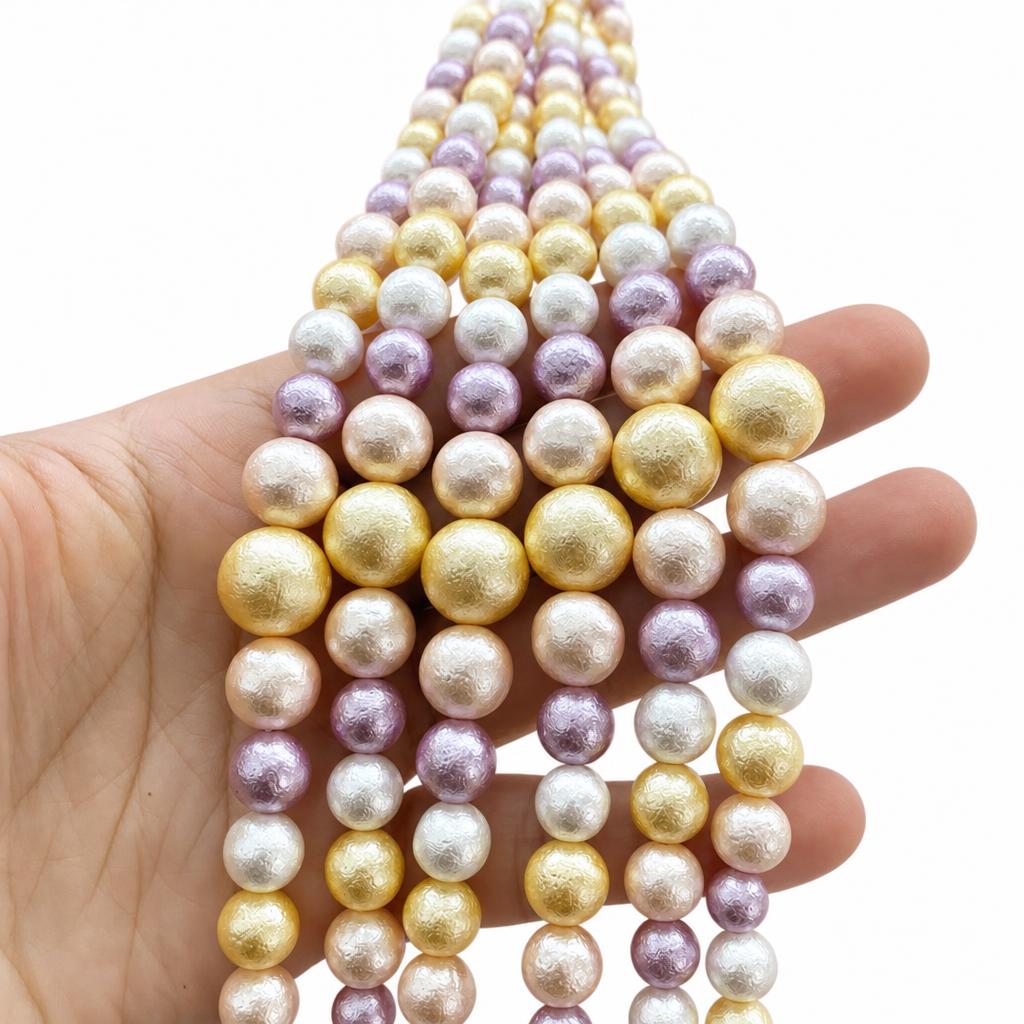Gold powder wrinkled leather mixed color shell bead tower chain