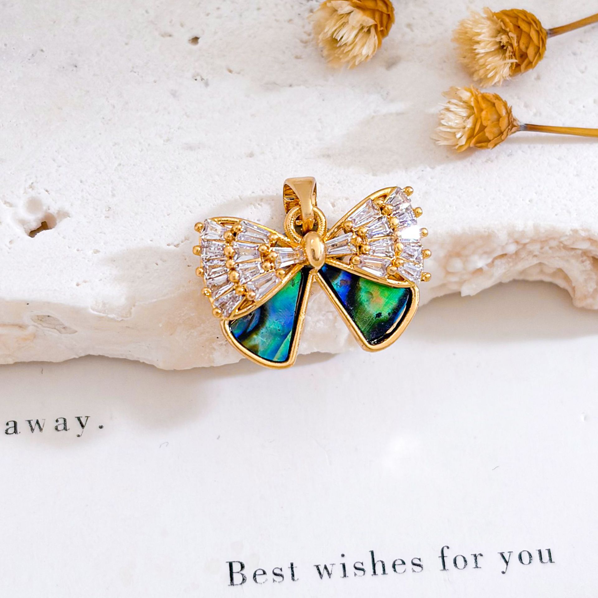 Xl1028 bow pendant gold