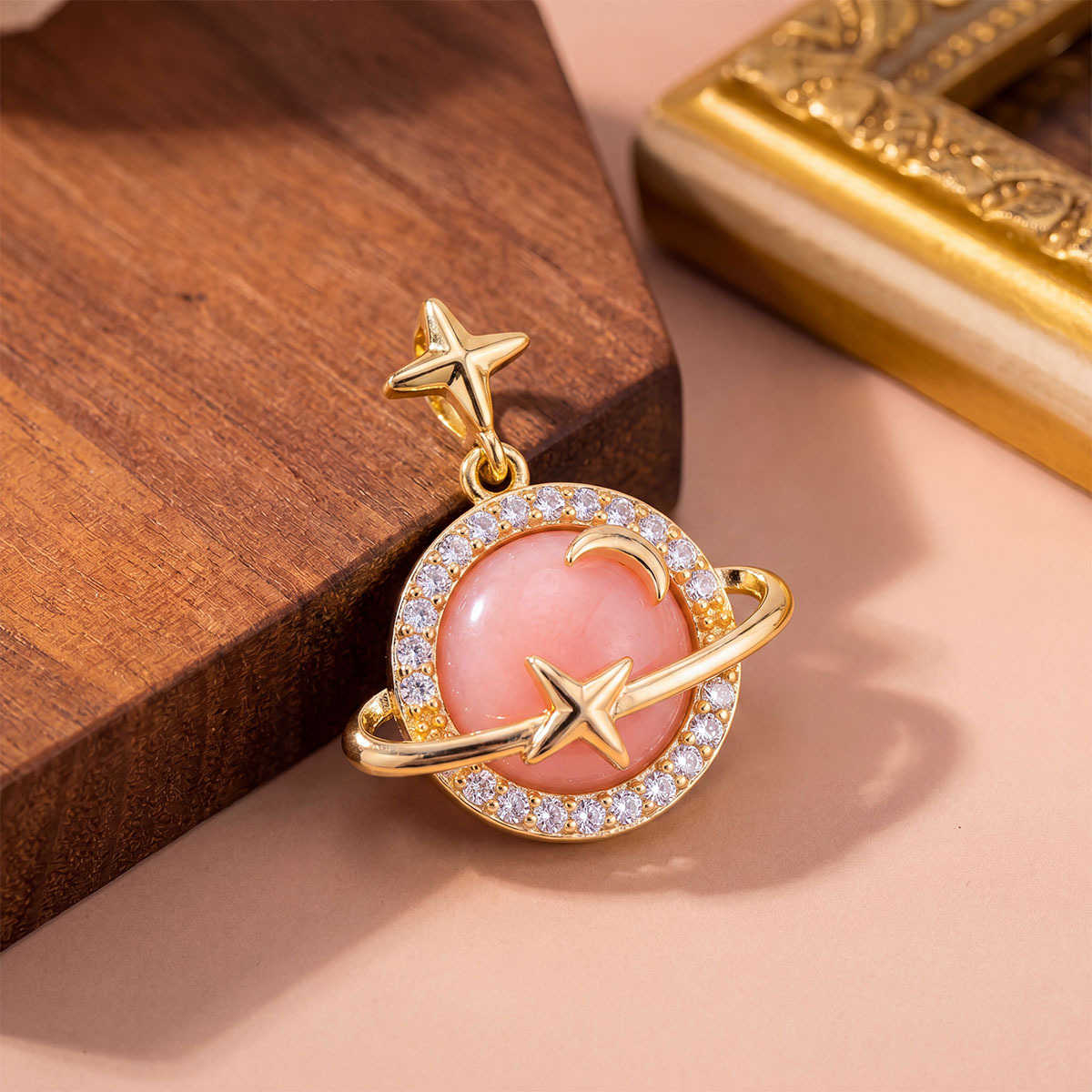Xl12 pink cat eye planet pendant gold