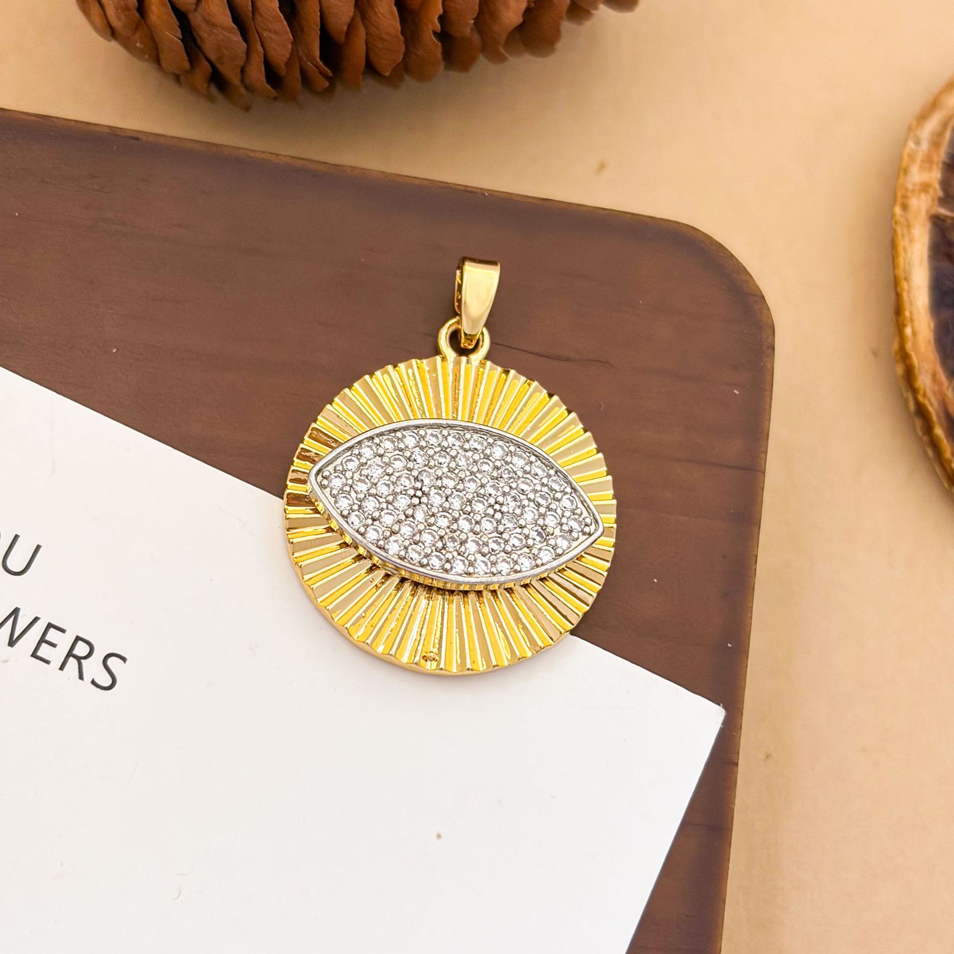 Xl3663 round eye two-color pendant