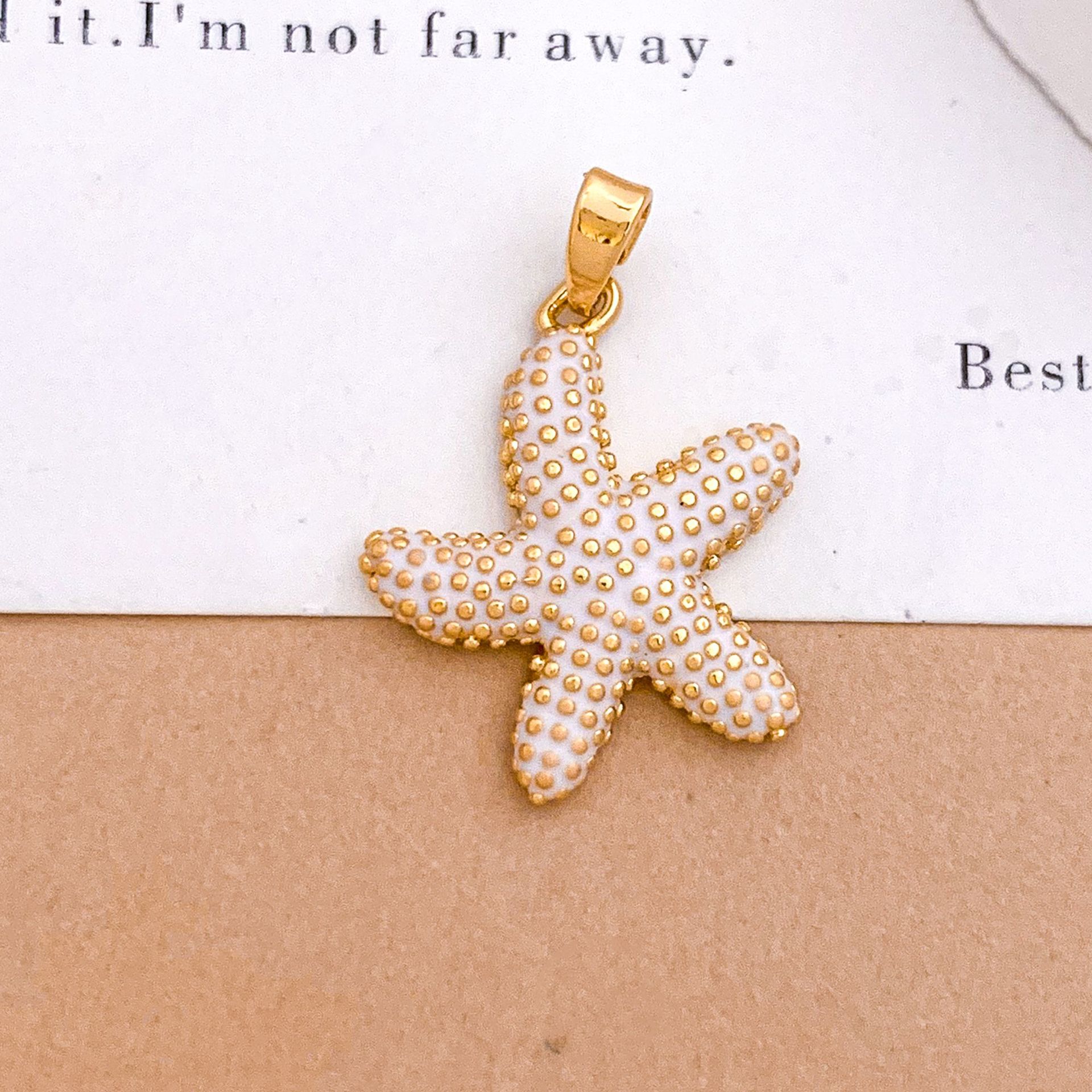 Xl4120 dancing starfish pendant gold white