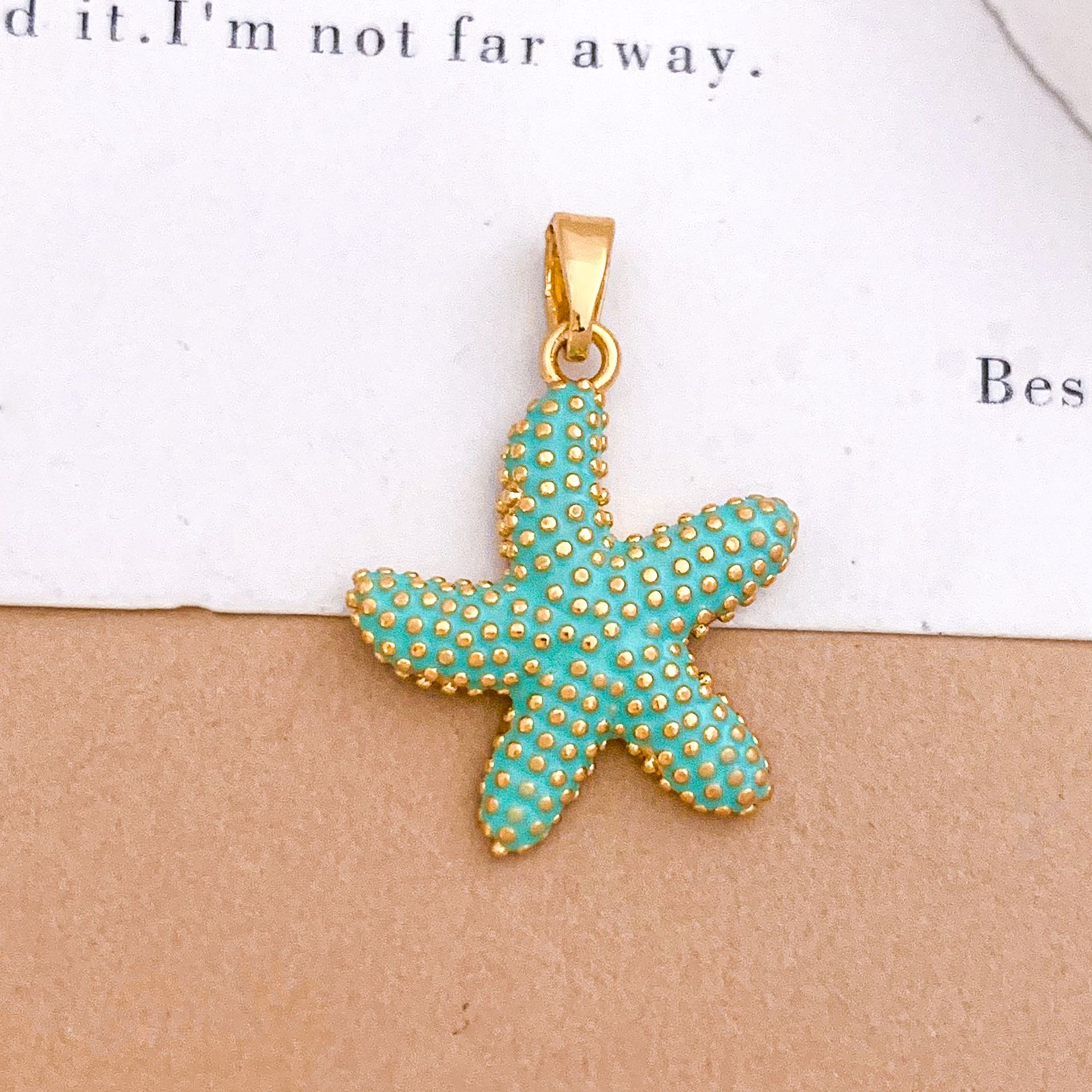 Xl4120 dancing starfish pendant gold light blue