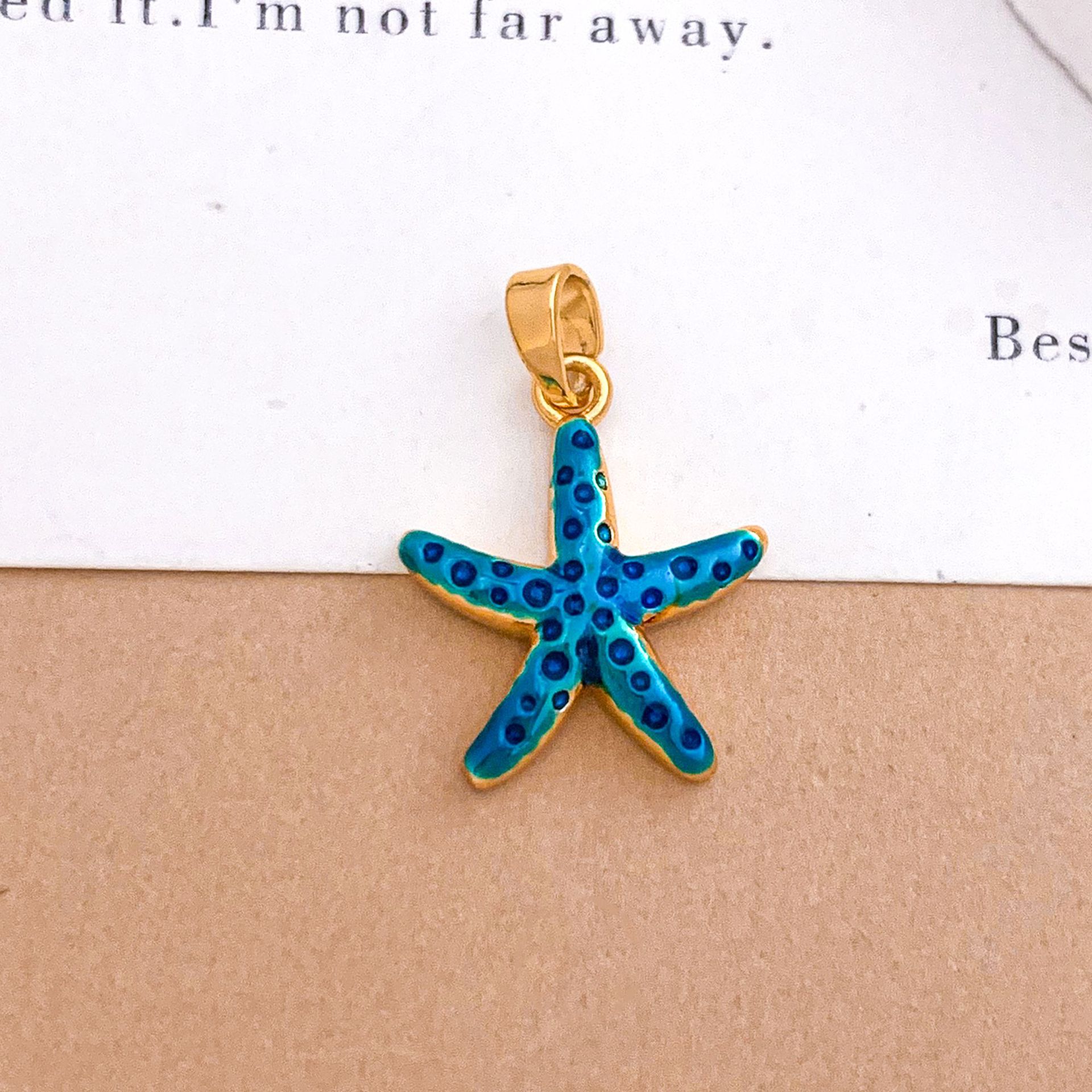 Xl4575 starfish pendant gold blue