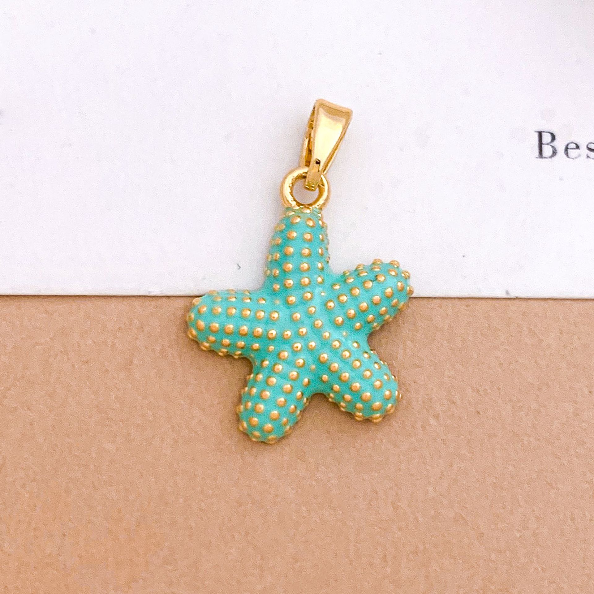 Xl4631 fat starfish pendant gold light blue
