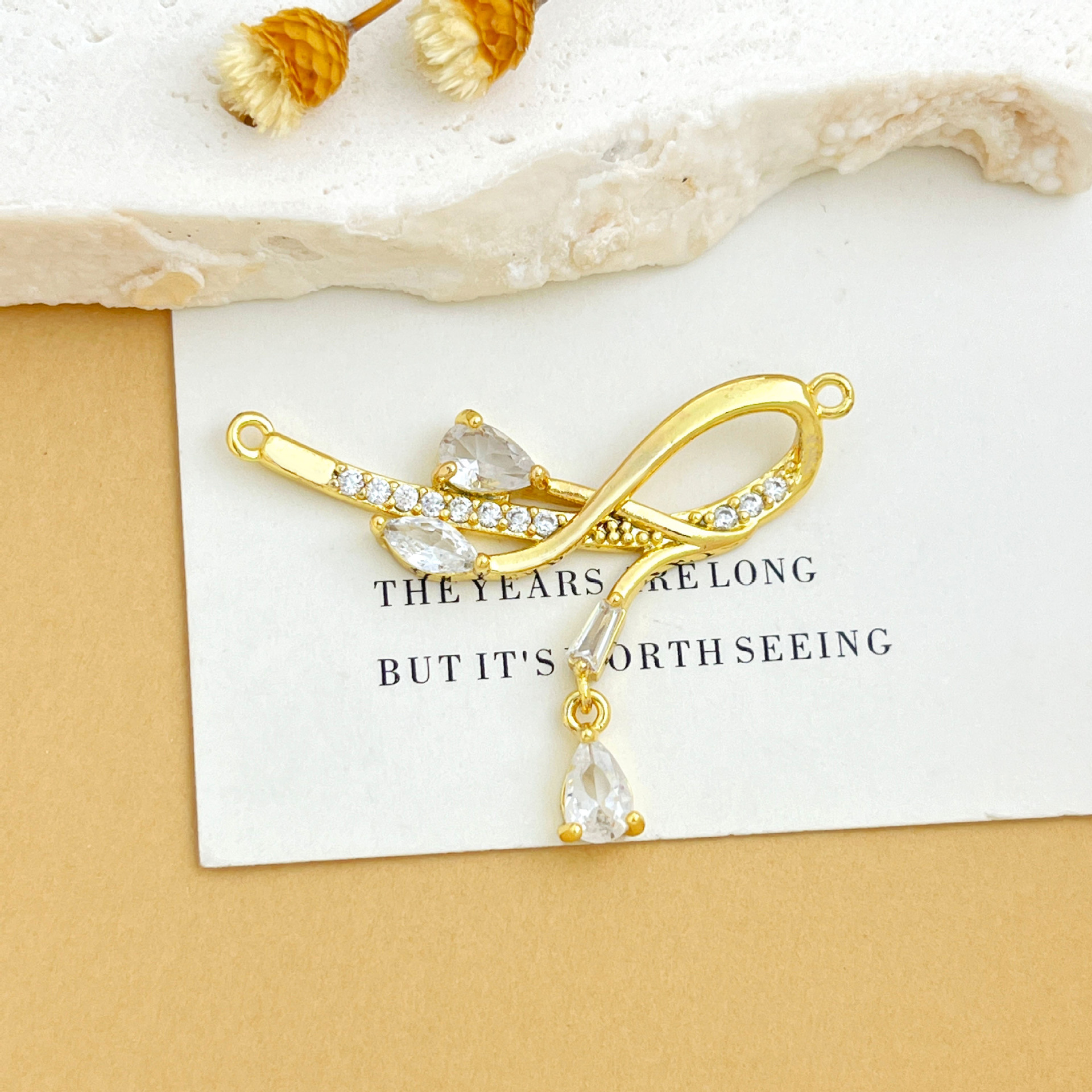 Xl6073 bow water drop pendant gold