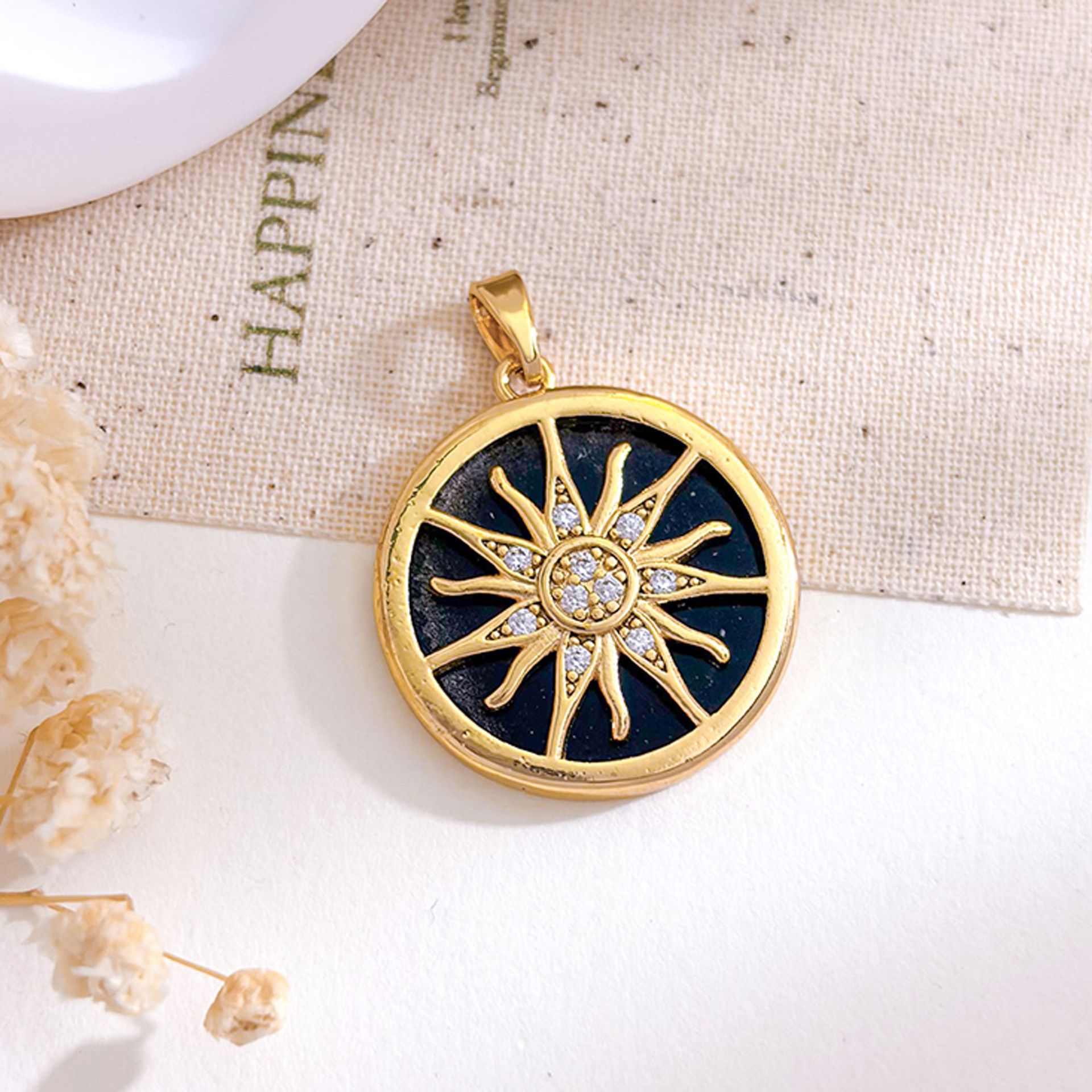 Xl5640 round sun pendant gold black