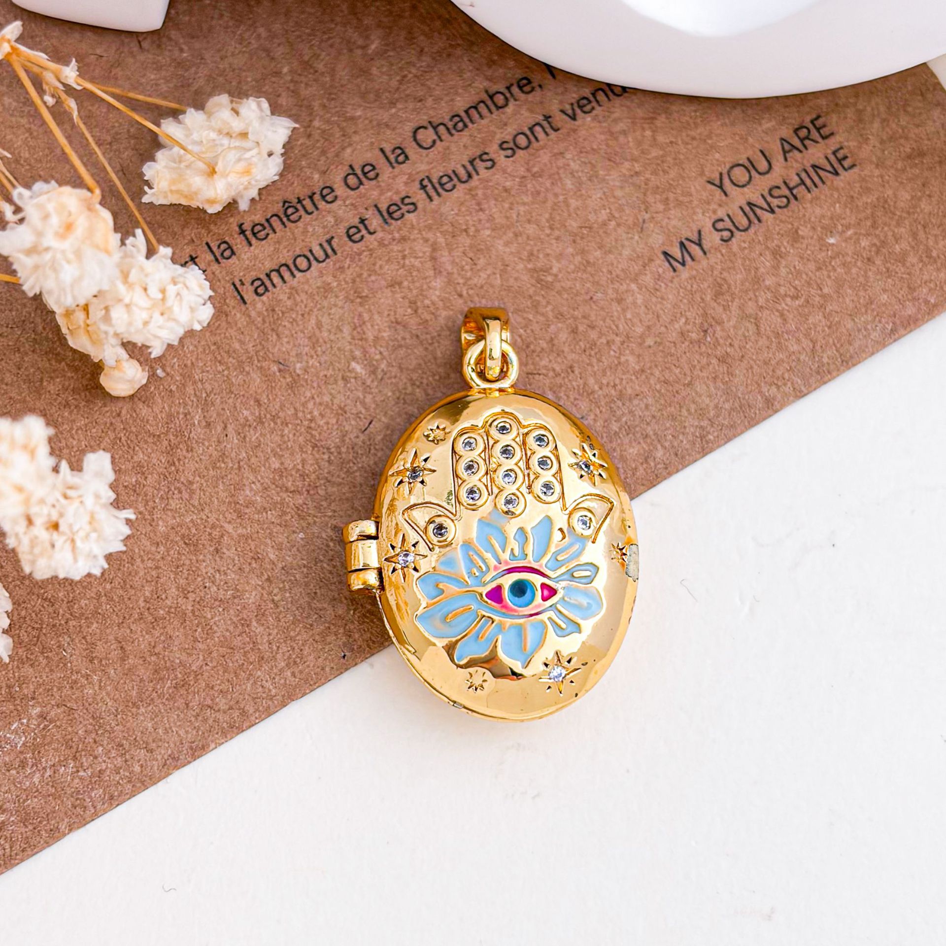 Xl5002 devil's eye photo clip pendant gold blue