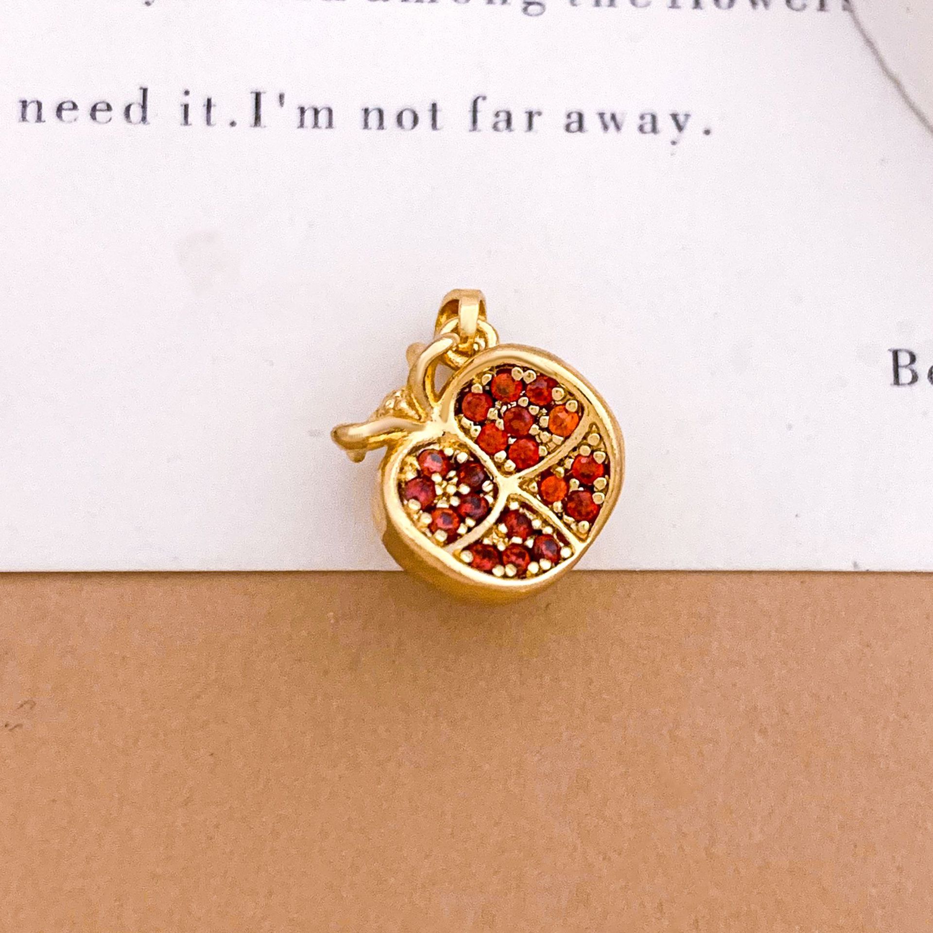 Xl5557 four-petal pomegranate pendant gold