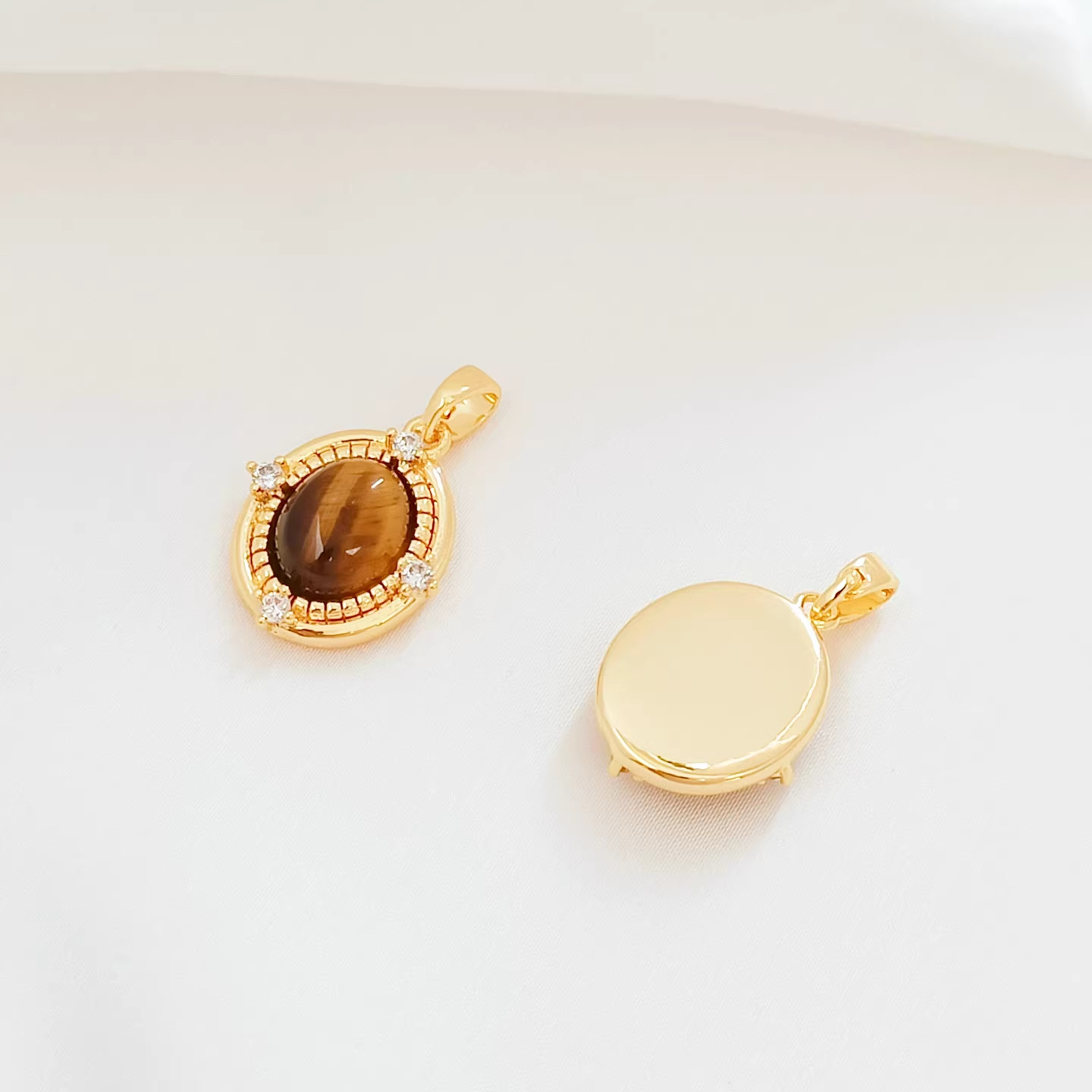 Cz986 oval tiger eye stone pendant gold