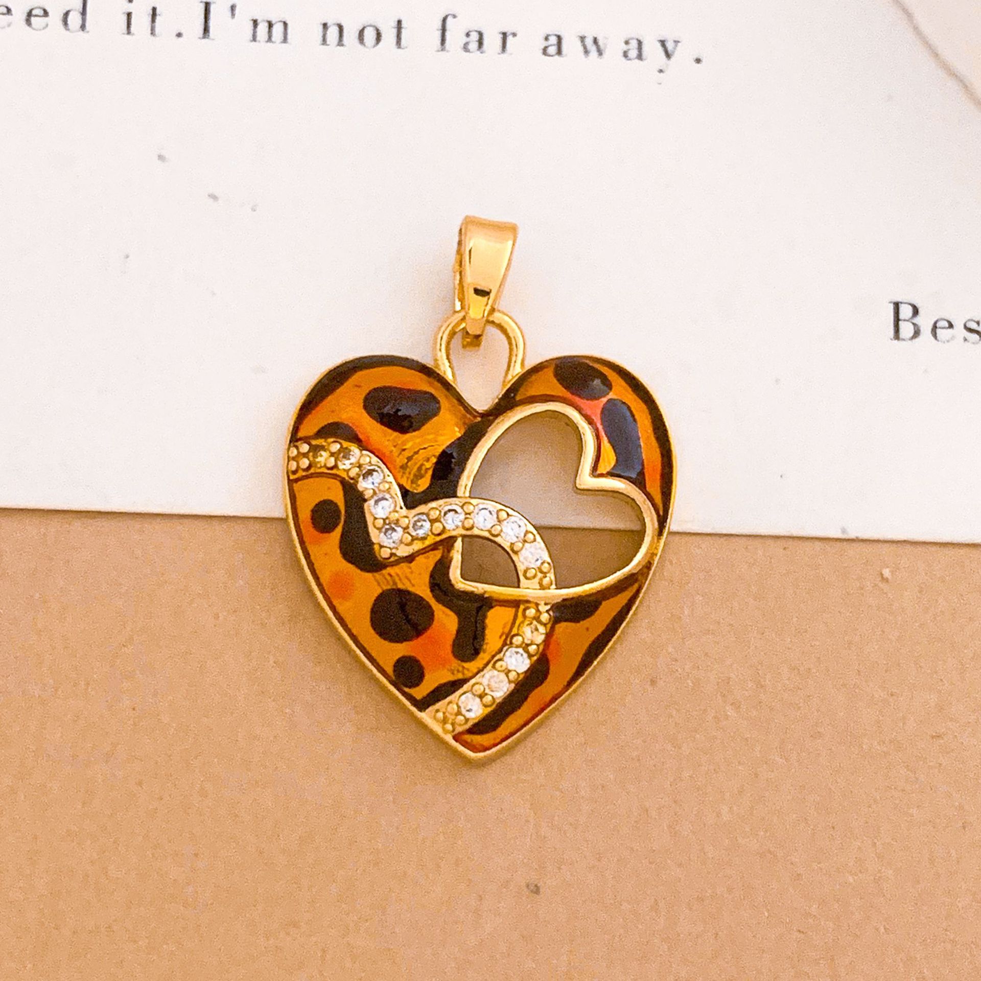 Xl5223 hollow leopard print love pendant gold