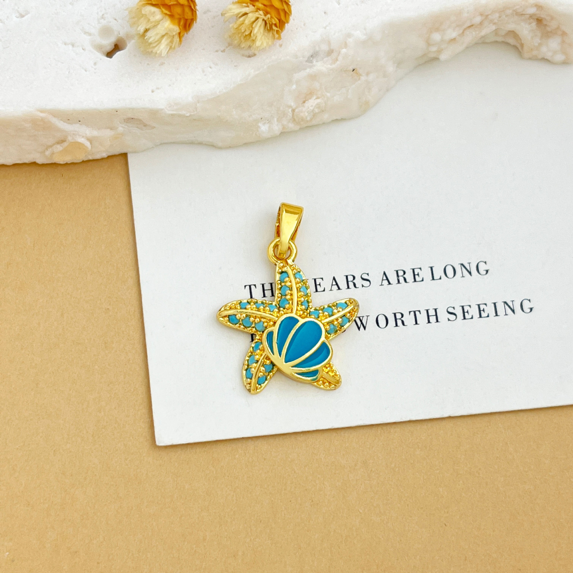 Xl4384 shell starfish pendant gold blue