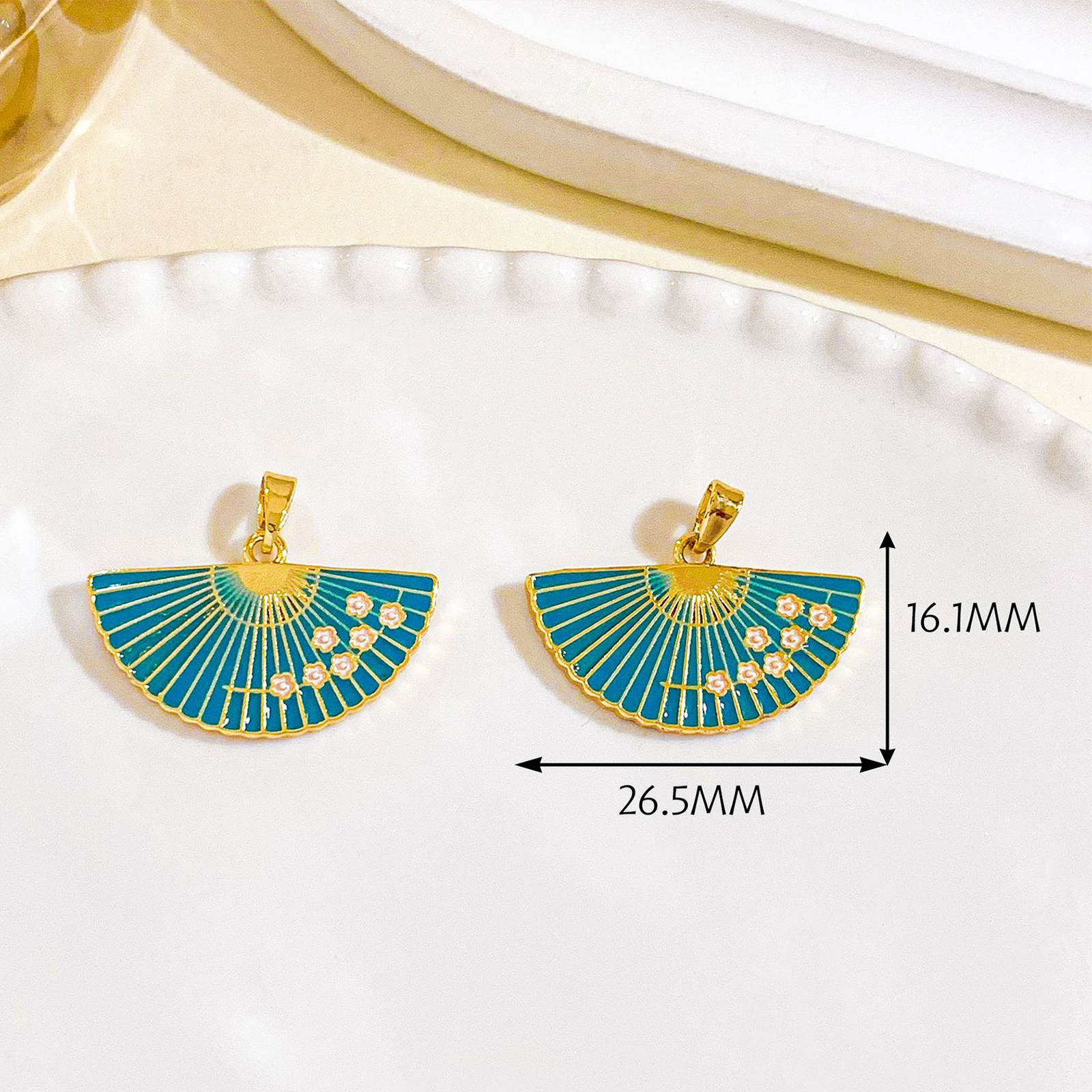 Xl4788 light blue plum blossom folding fan pendant gold