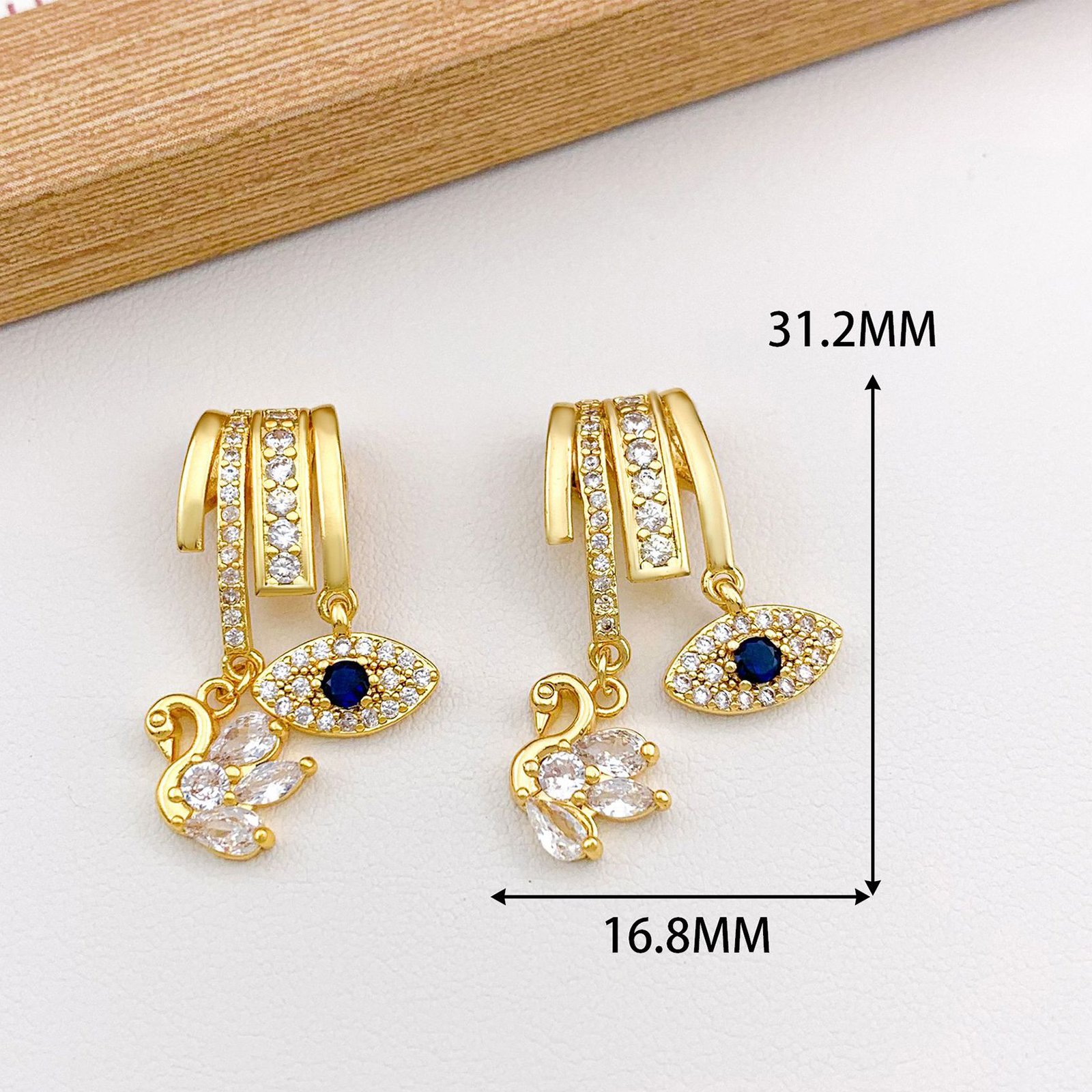 Xl3274 swan eyes combination pendant gold