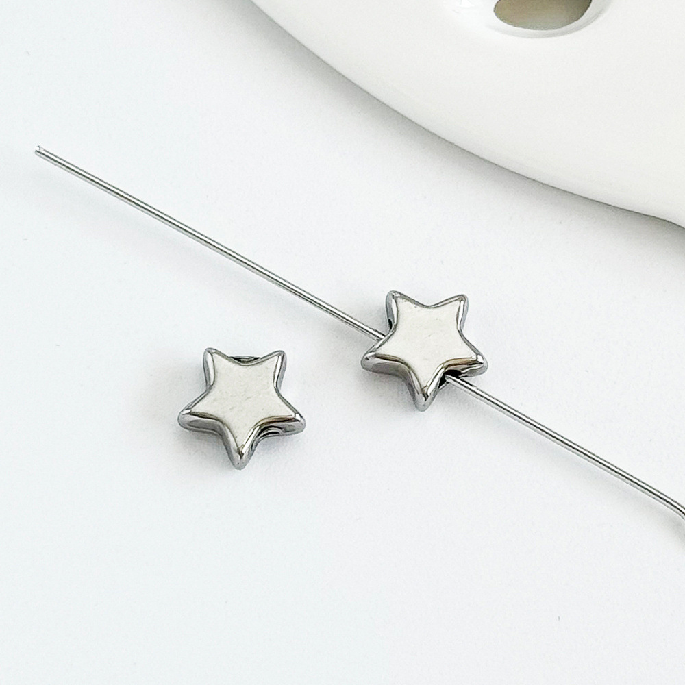Steel color five-pointed star 7x8mm