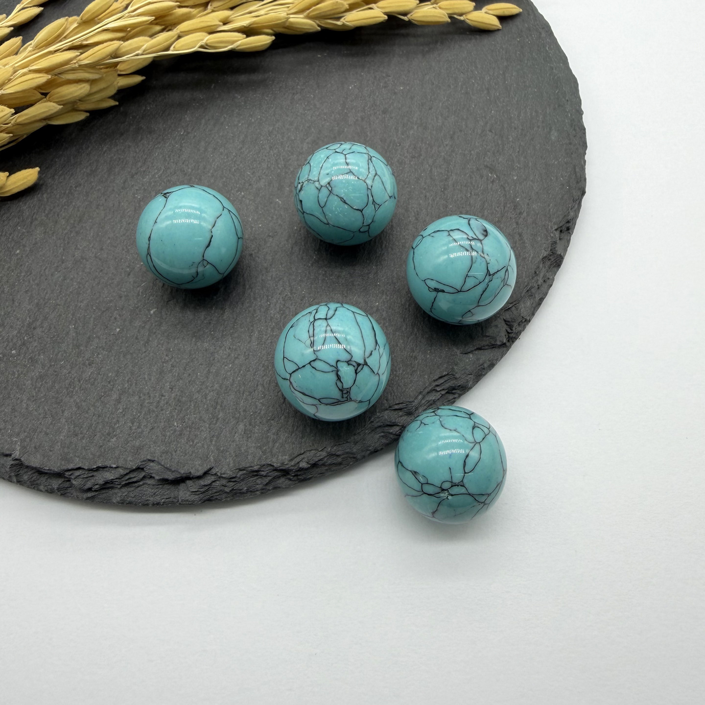 One turquoise