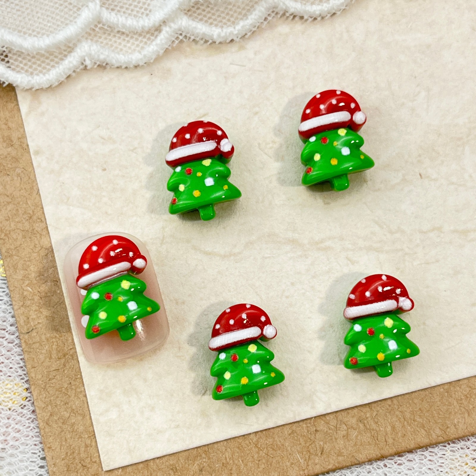 # 2 Christmas tree hats