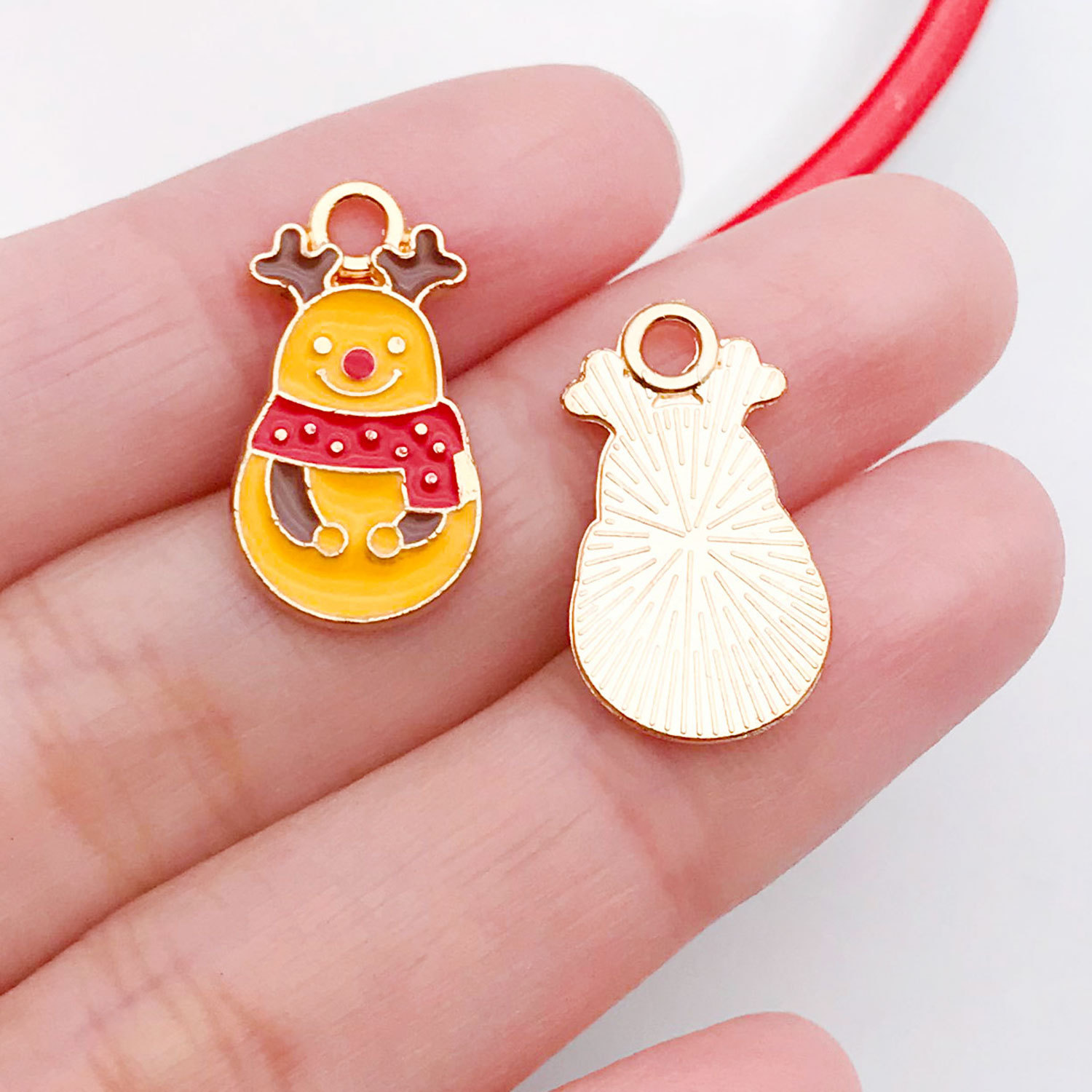 21057-1 yellow zinc alloy christmas elk snowman 20x11mm-1g