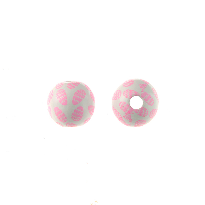 Pink eggs on white background