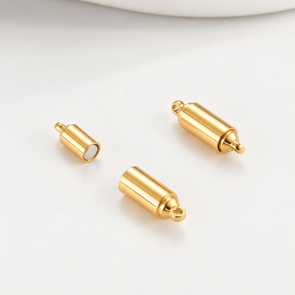 Gold integrated pull ring buckle