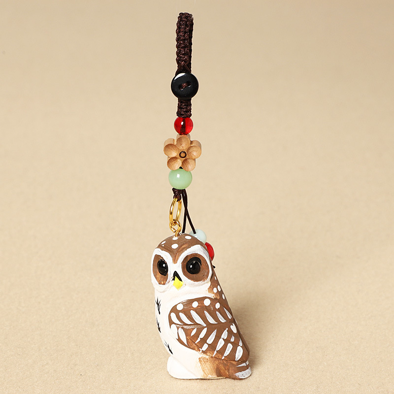 Wood carving owl-peach wood plum blossom style