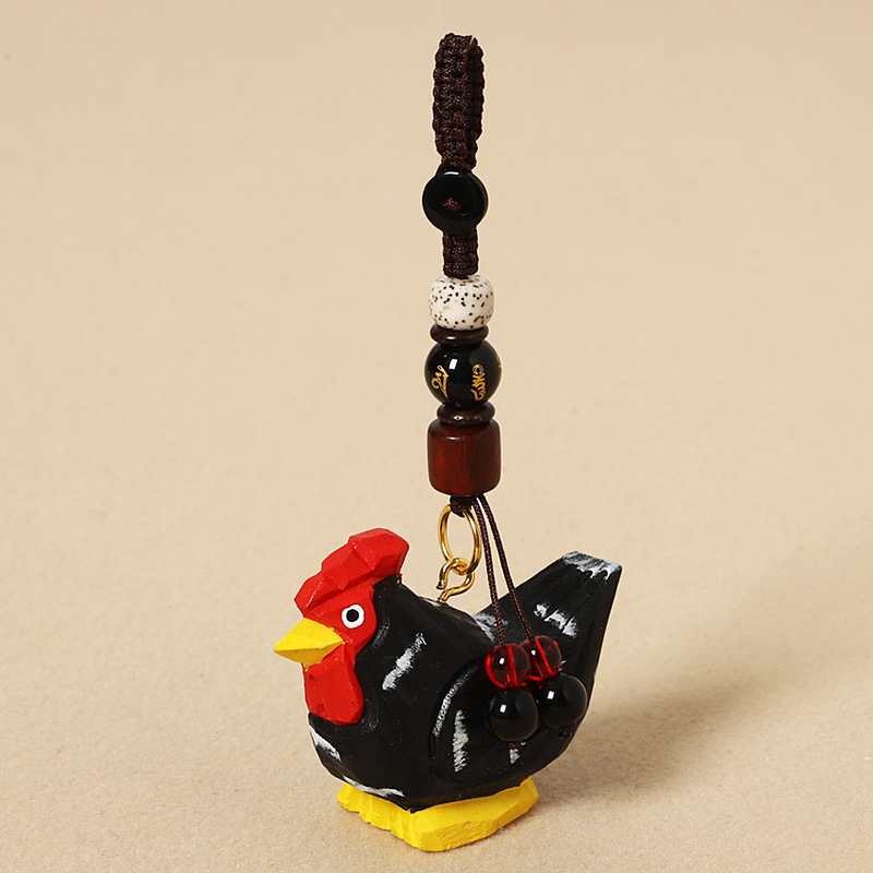 Wood-carved black chick - Six-character mantra version